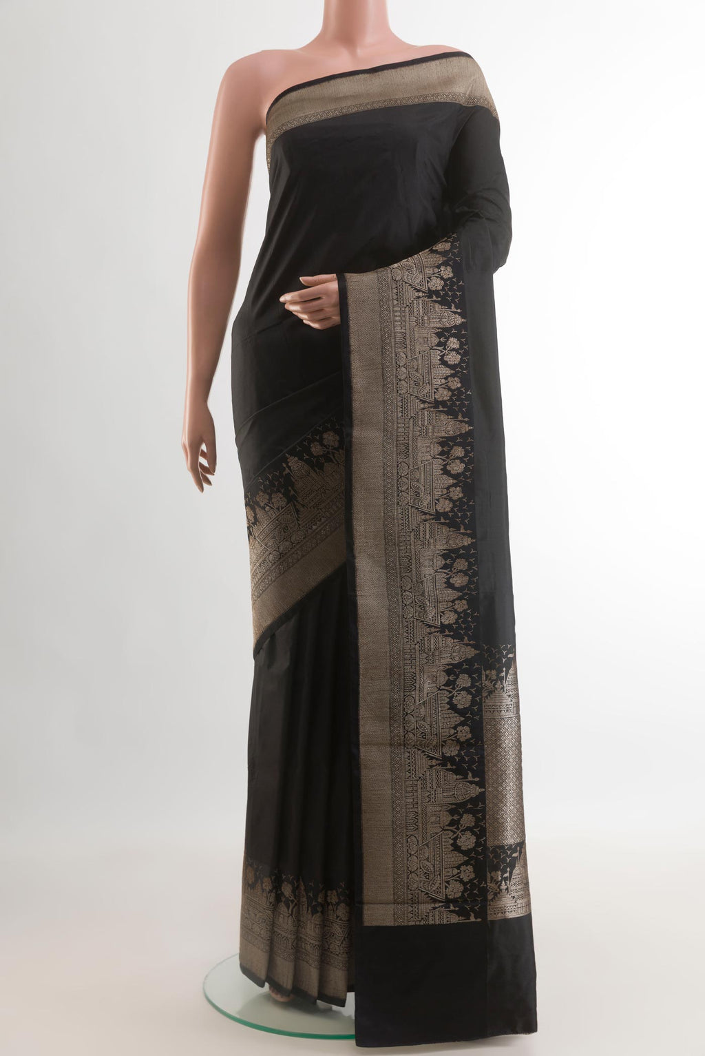 Black Banarasi Katan Silk Saree with Zari Butta on the body and Zari Border.  displayed on a mannequin