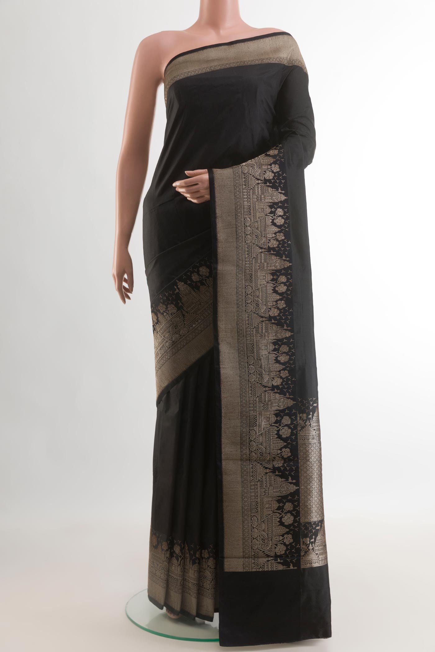 Black Banarasi Katan Silk Saree with Zari Butta on the body and Zari Border.  displayed on a mannequin