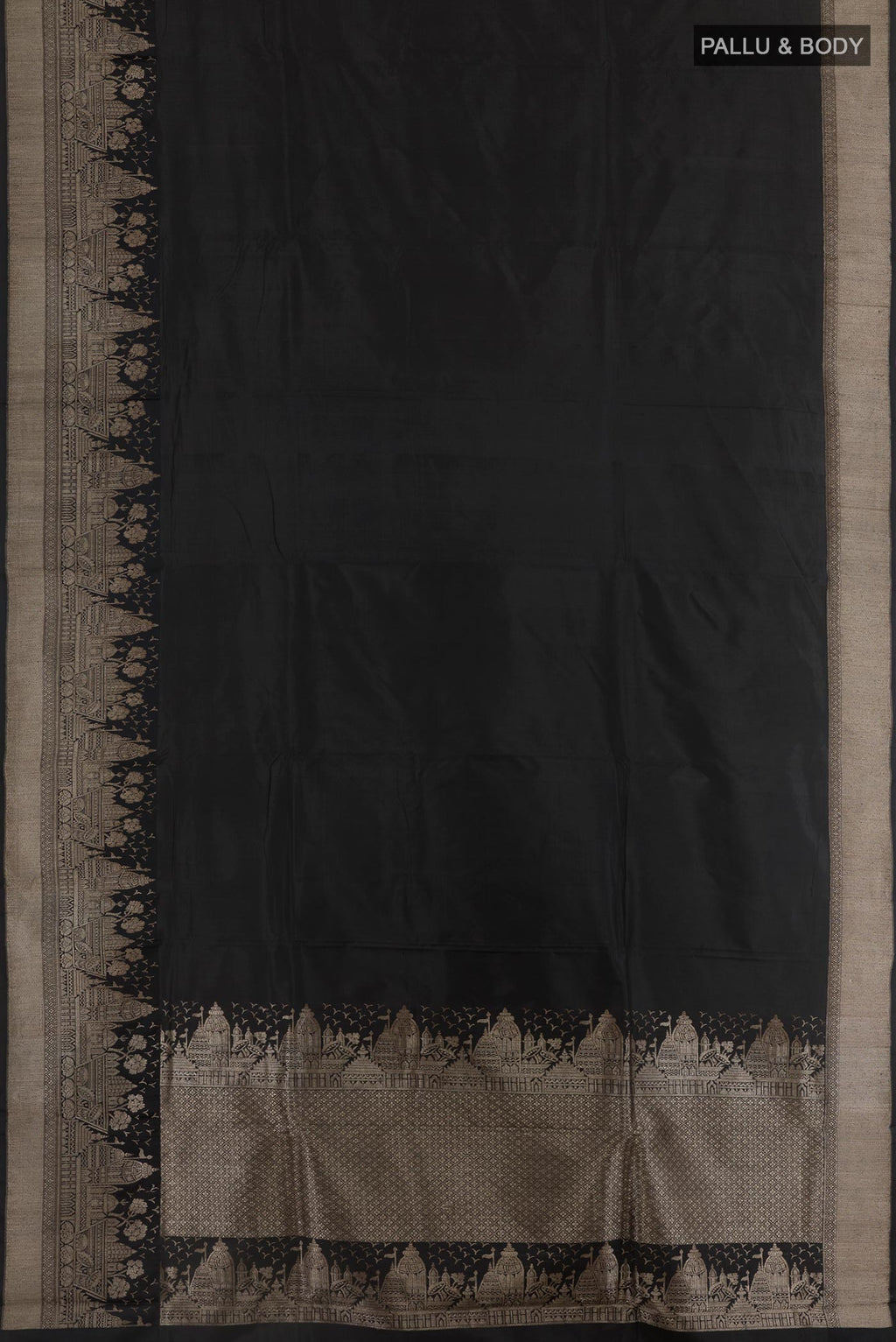 Flat view of Black Banarasi Katan Silk Saree with Zari Butta on the body and Zari Border. 