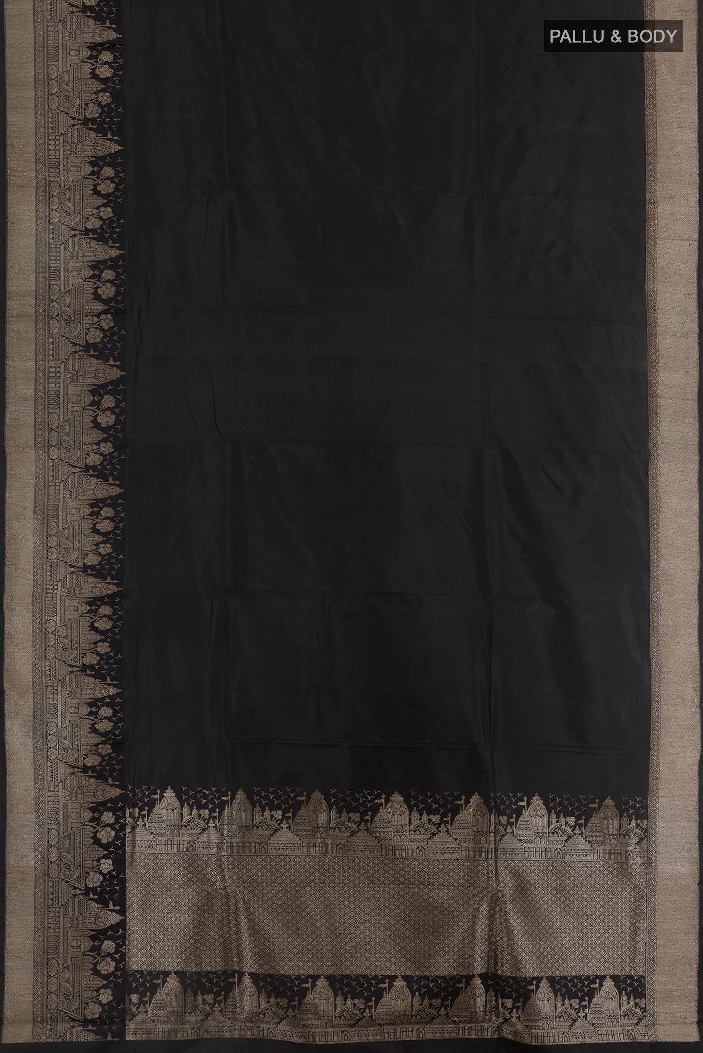 Flat view of Black Banarasi Katan Silk Saree with Zari Butta on the body and Zari Border. 