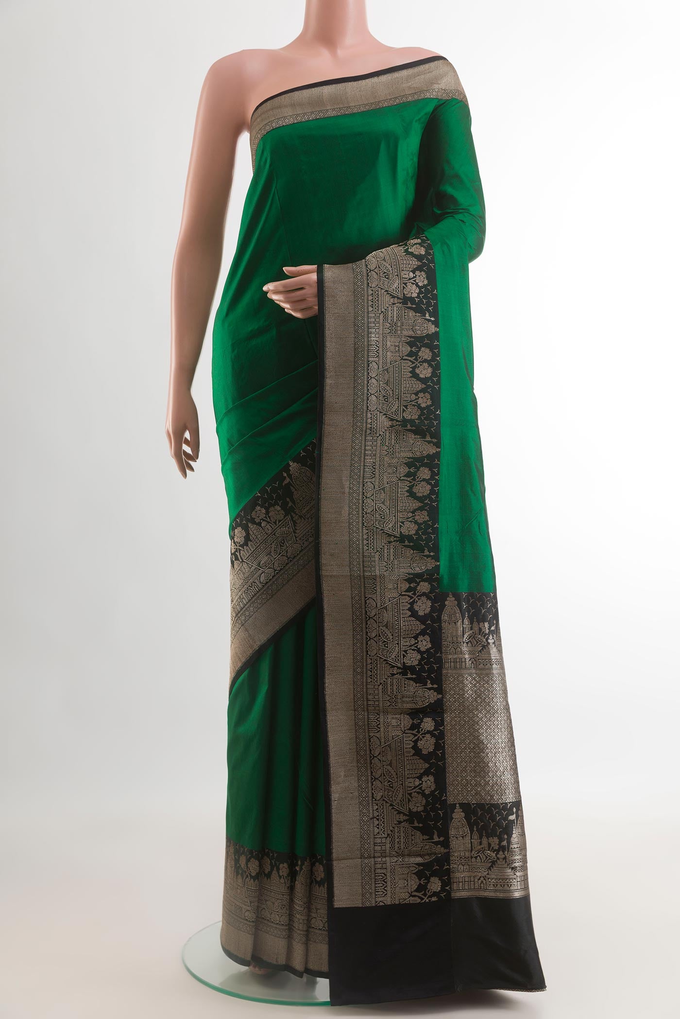 Green Banarasi Katan Silk Saree with Plain Body and Zari Border.  displayed on a mannequin