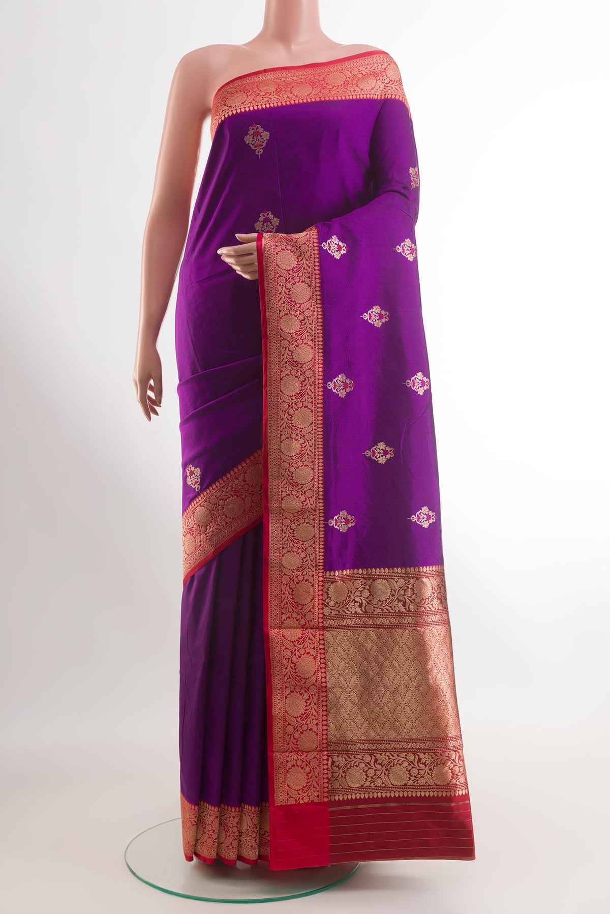 Purple Banarasi Katan Silk Saree with Zari Butta on the body and Zari Border.  displayed on a mannequin