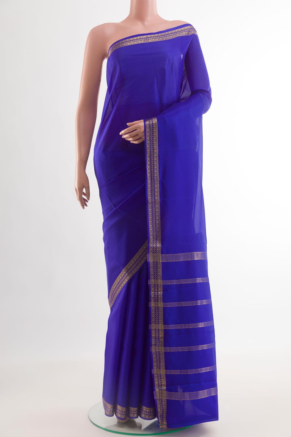 Royal Blue Mysore Crepe Saree with Plain Body and Zari Border.  displayed on a mannequin