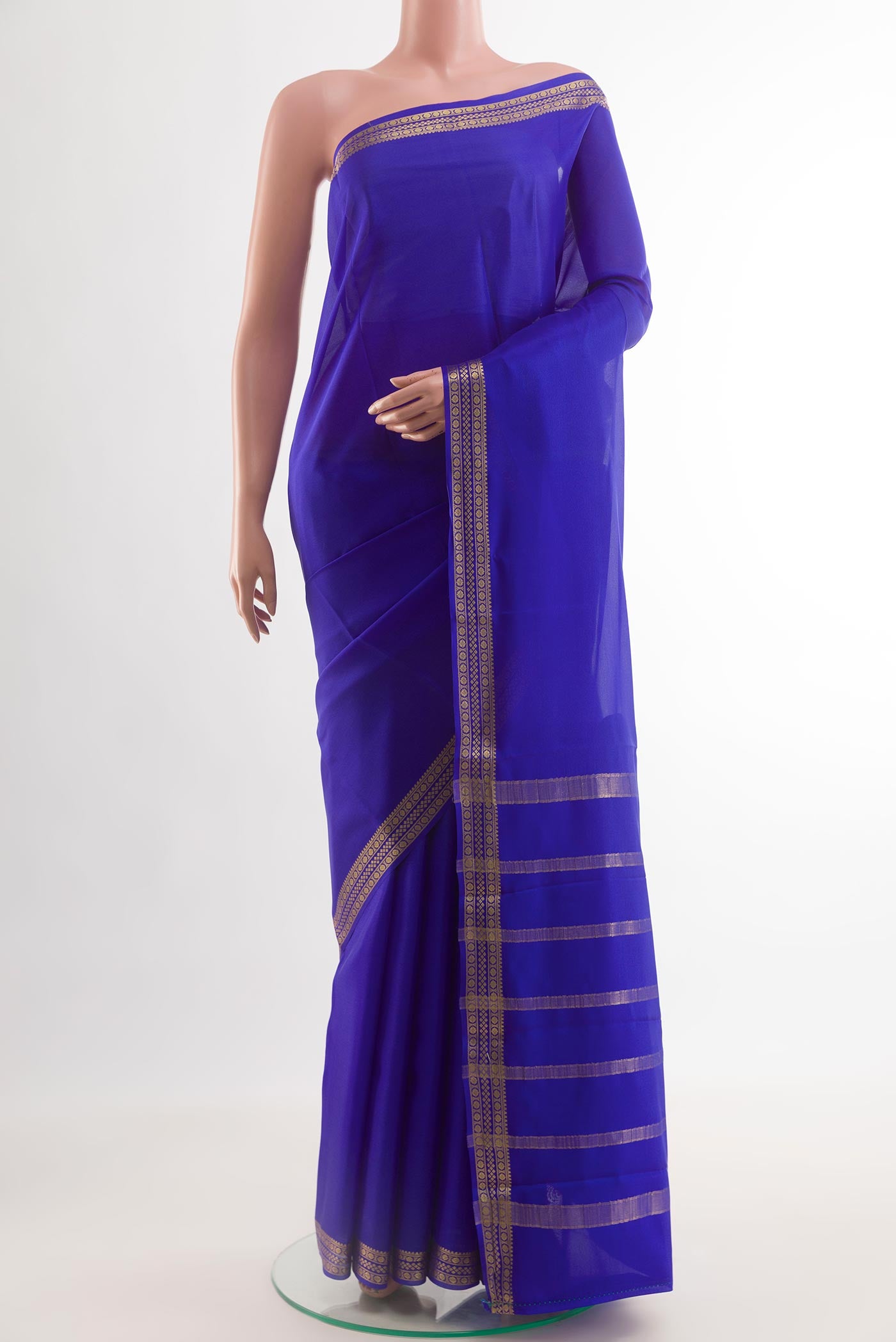 Royal Blue Mysore Crepe Saree with Plain Body and Zari Border.  displayed on a mannequin