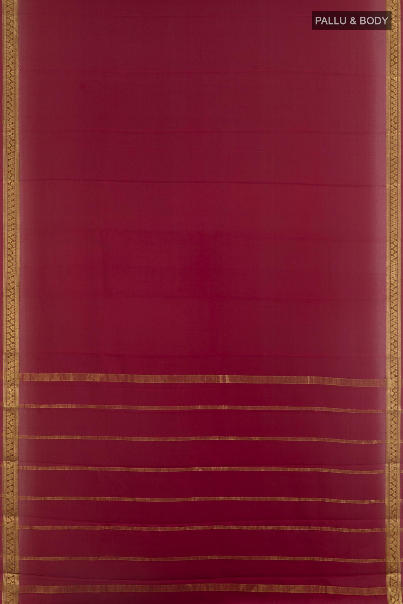 Flat view of Maroon Mysore Crepe Saree with Plain Body and Zari Border. 
