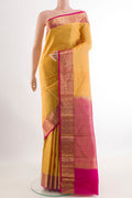 Yellow Kanchipuram Silk Saree with Plain Body and Zari Border.  displayed on a mannequin