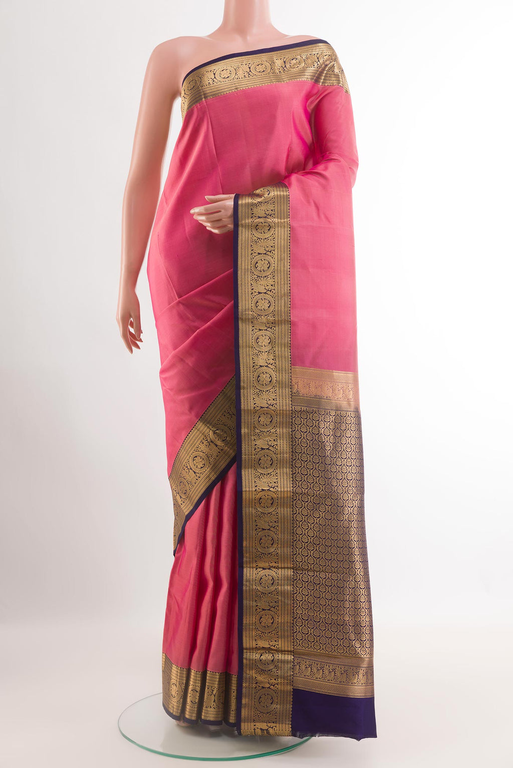 Pink Kanchipuram Silk Saree with Plain Body and Zari Border.  displayed on a mannequin