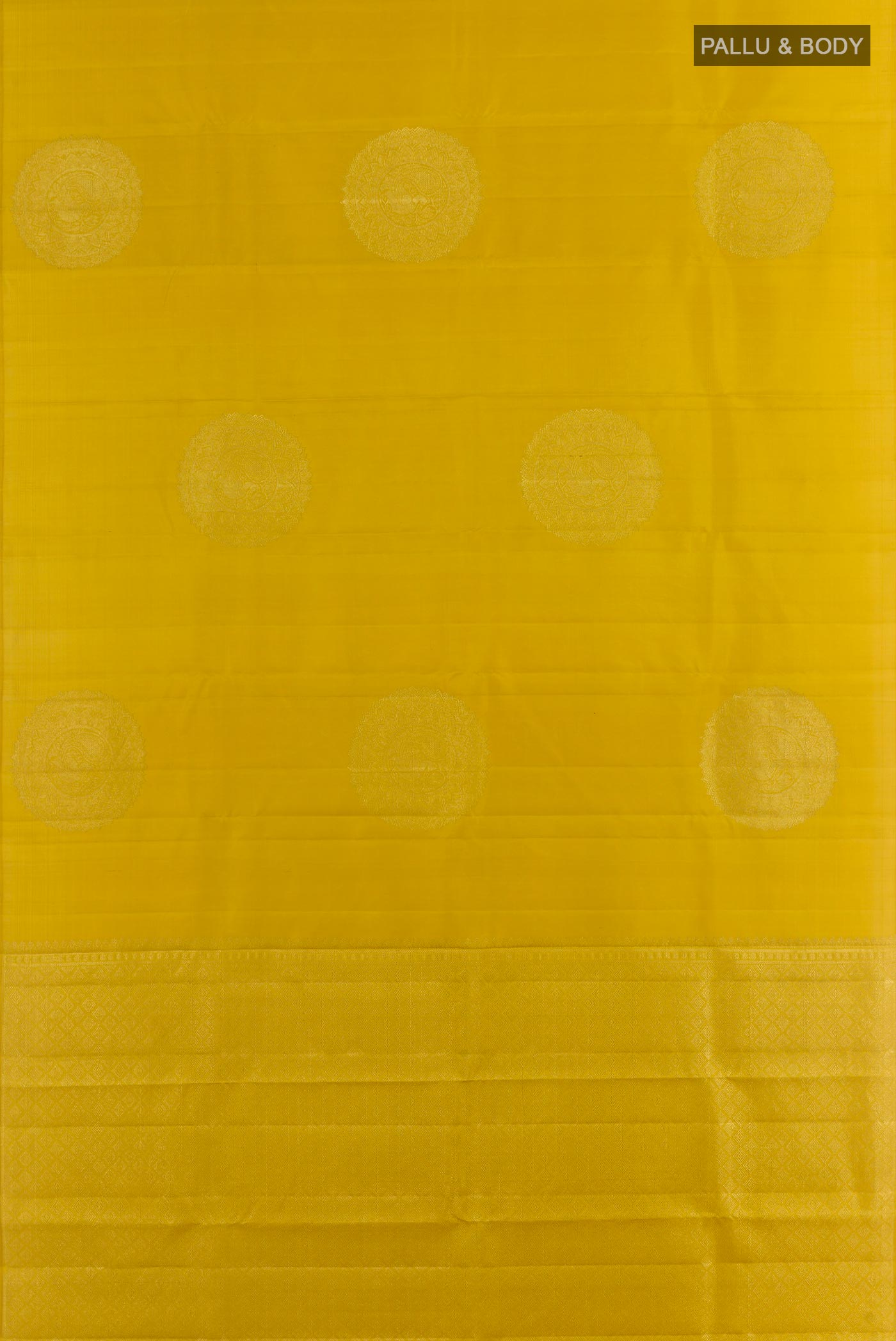 Flat view of Mustard Kanchipuram Silk Saree with Zari Butta on the body and Without Border. 
