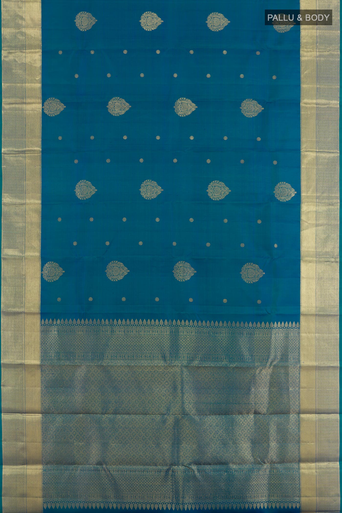 Flat view of Blue Kanchipuram Silk Saree with Zari Butta on the body and Zari Border. 