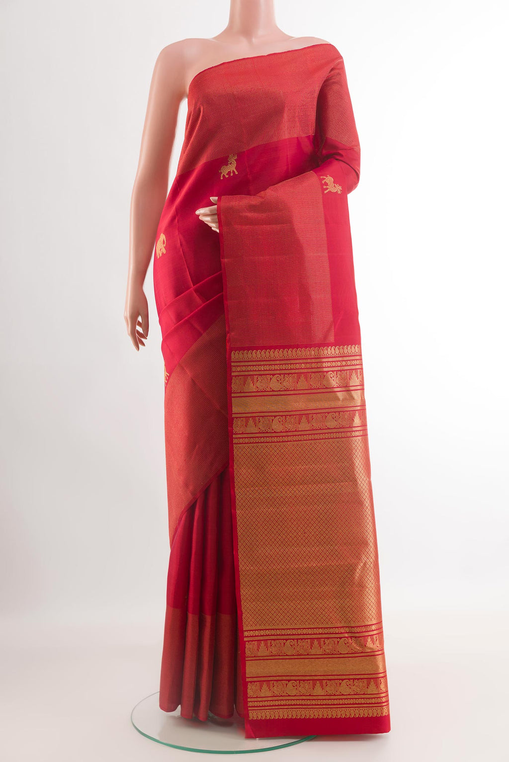 Red Kanjivaram Silk Saree with Zari Butta on the body and Zari Border.  displayed on a mannequin