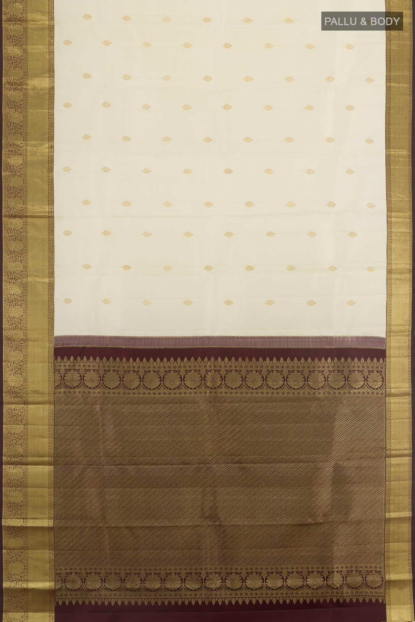 Flat view of Off White Kanjivaram Silk Saree with Zari Butta on the body and Zari Border. 