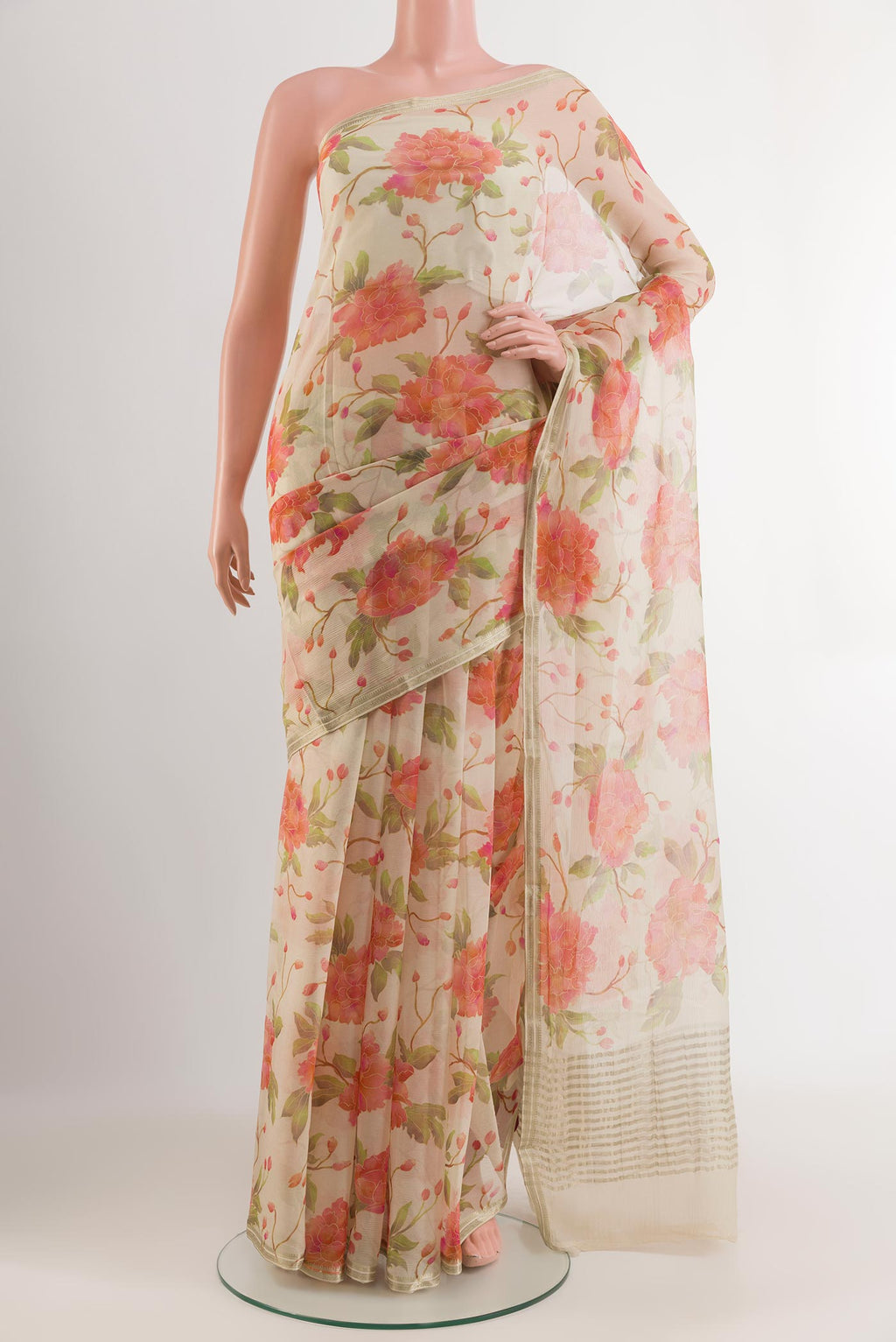 Off White Mysore Chiffon Saree with Printed design on the body and Zari Border.  displayed on a mannequin