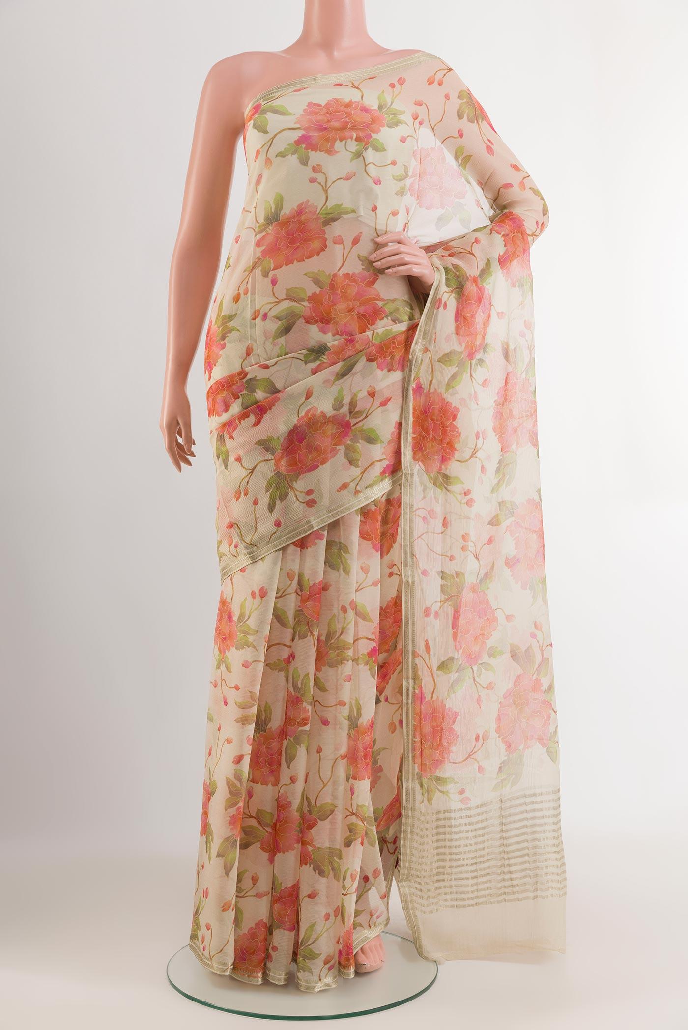 Off White Mysore Chiffon Saree with Printed design on the body and Zari Border.  displayed on a mannequin