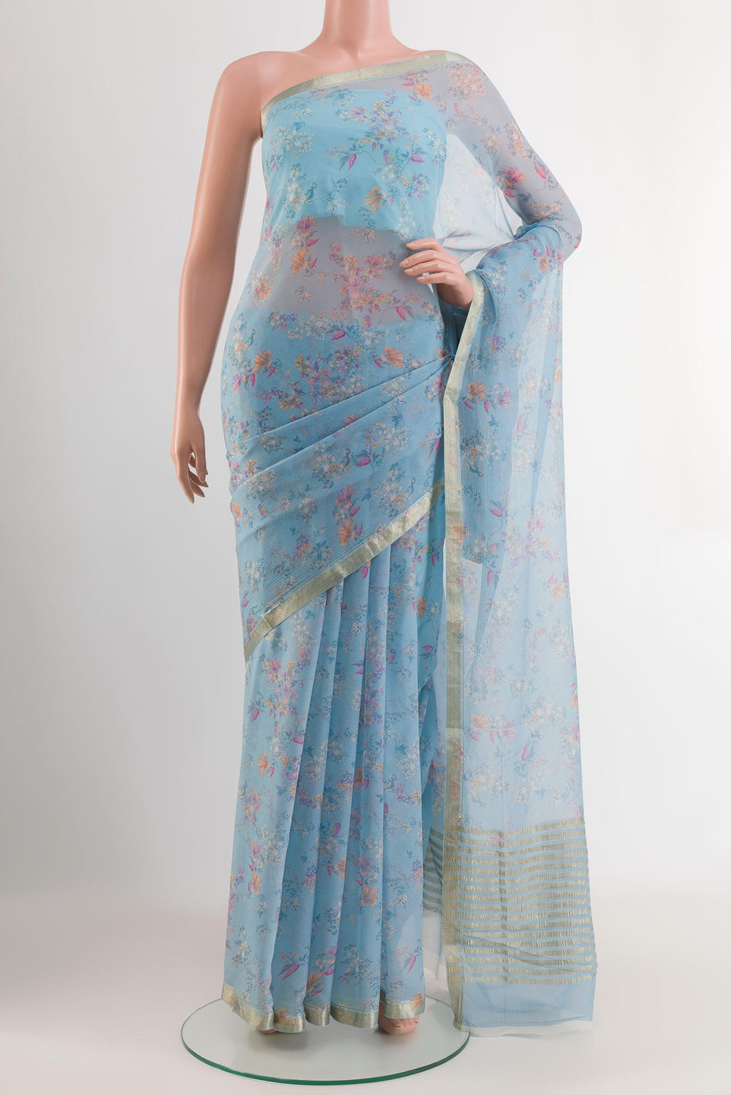 Blue Mysore Chiffon Saree with Stripes on the body and Zari Border.  displayed on a mannequin