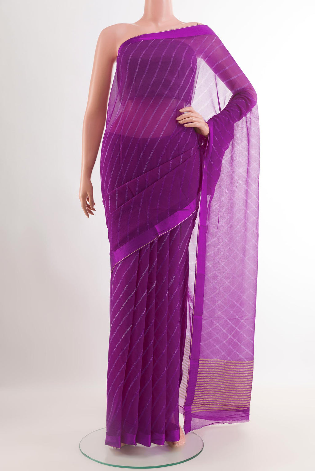 Purple Chiffon Saree with Stripes on the body and Zari Border.  displayed on a mannequin