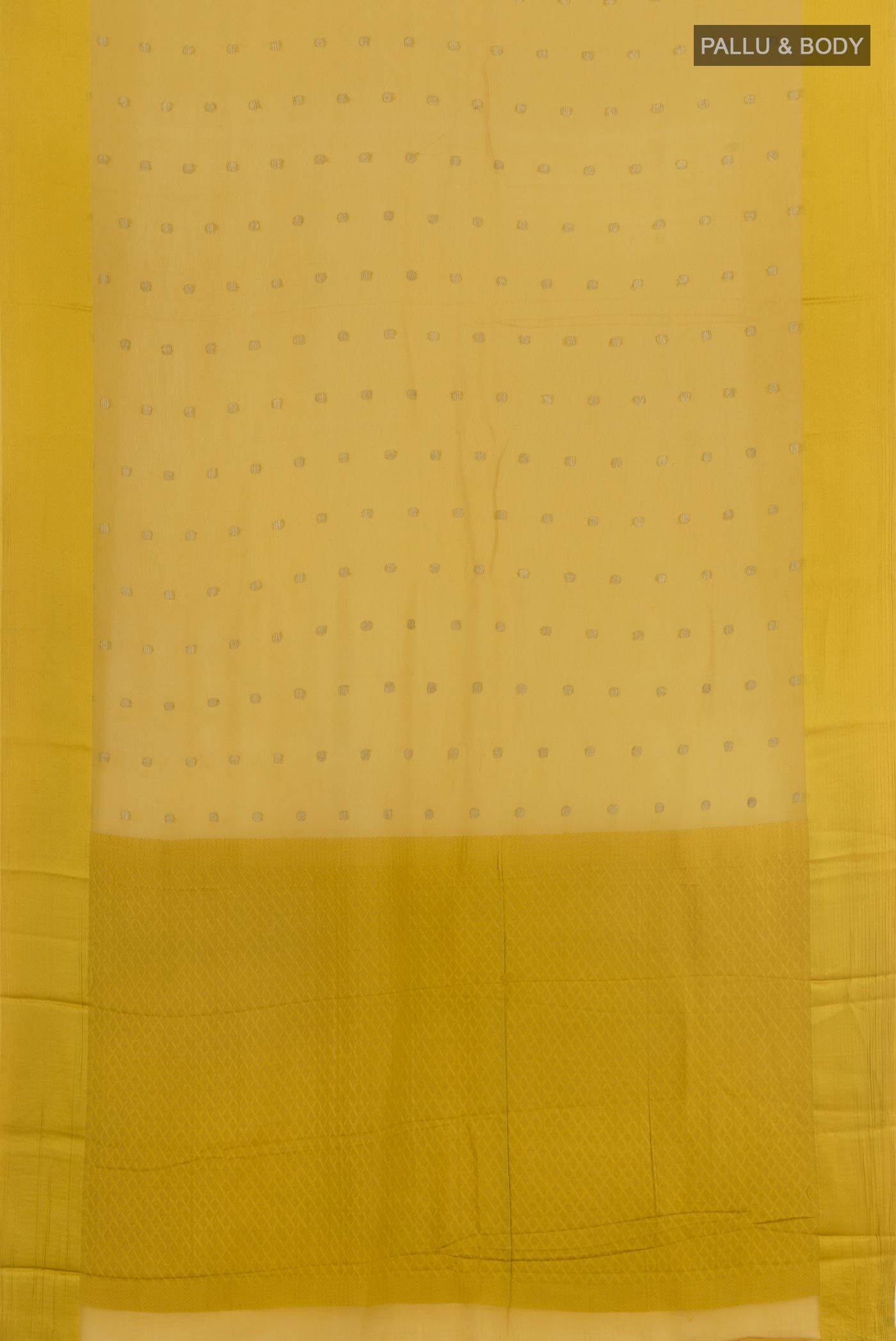 Flat view of Yellow Mysore Chiffon Saree with Zari Butta on the body and Zari Border. 