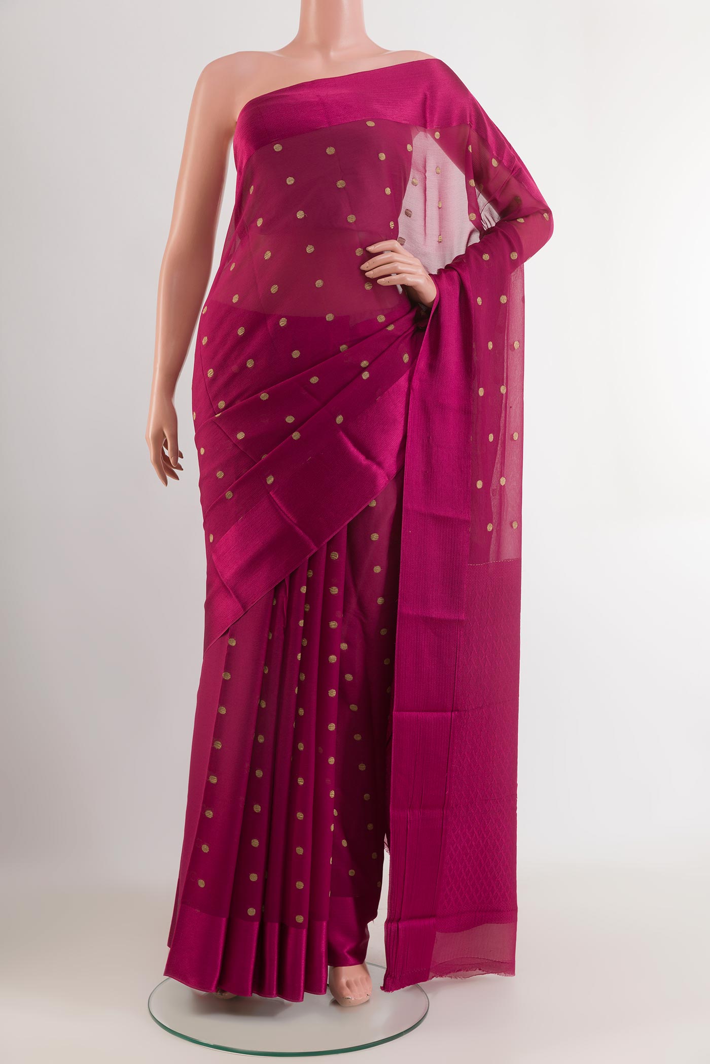 Pink Mysore Chiffon Saree with Zari Butta on the body and Zari Border.  displayed on a mannequin