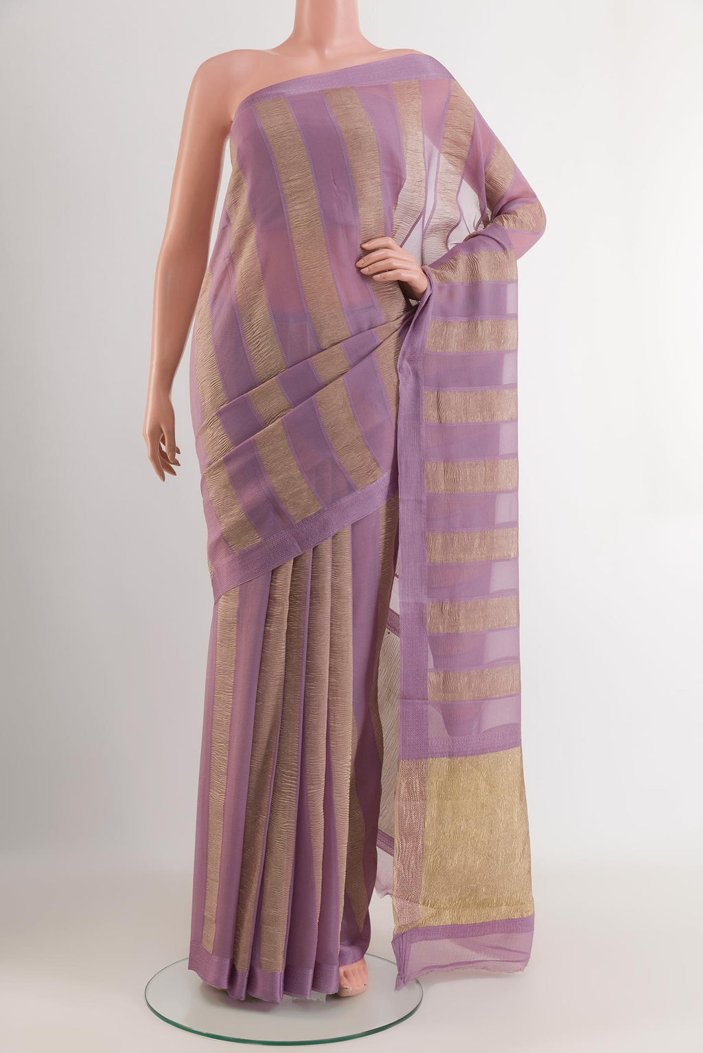 Lavender Mysore Chiffon Saree with Stripes on the body and Zari Border.  displayed on a mannequin
