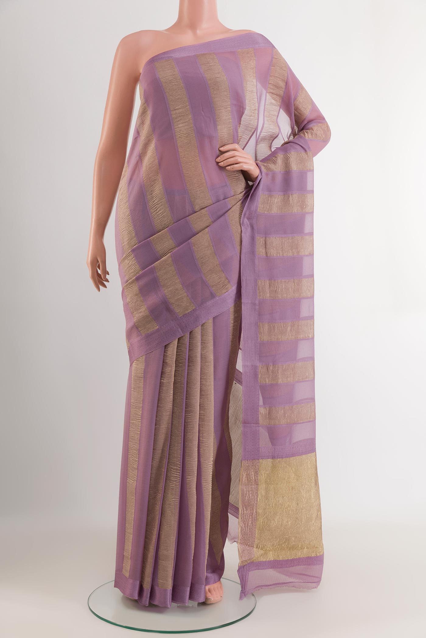 Lavender Mysore Chiffon Saree with Stripes on the body and Zari Border.  displayed on a mannequin