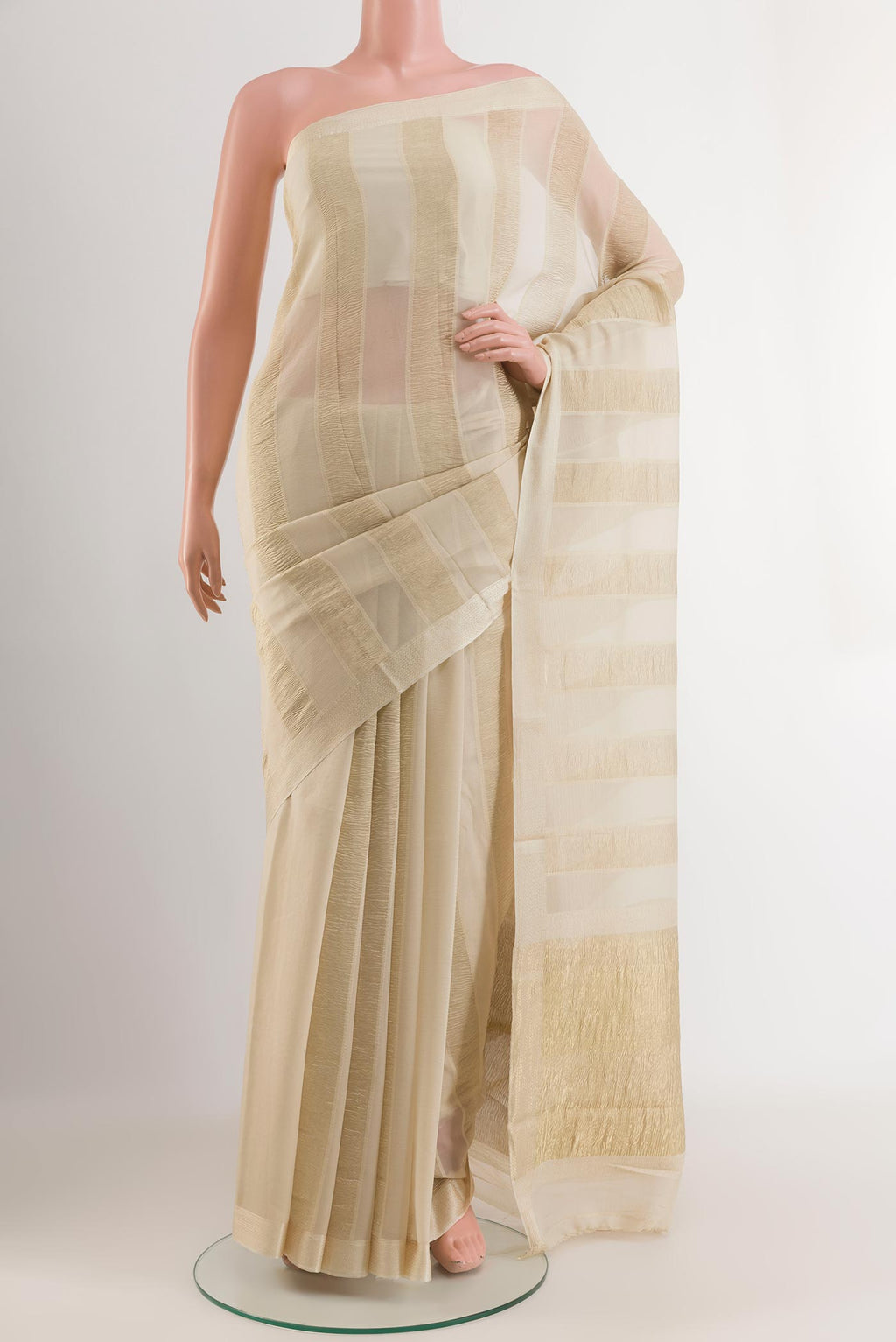 Off White Mysore Chiffon Saree with Stripes on the body and Zari Border.  displayed on a mannequin