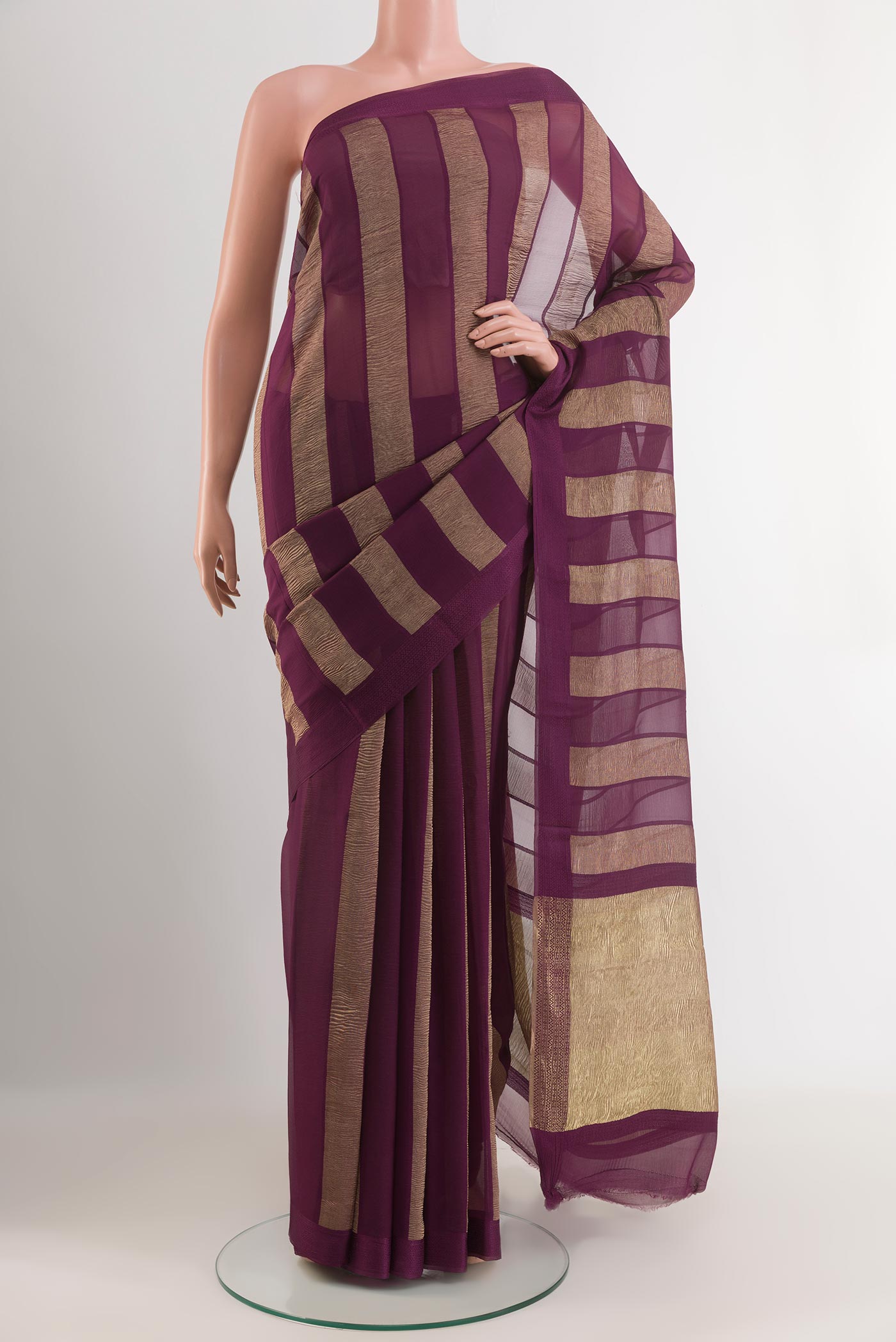 Purple Mysore Chiffon Saree with Stripes on the body and Zari Border.  displayed on a mannequin