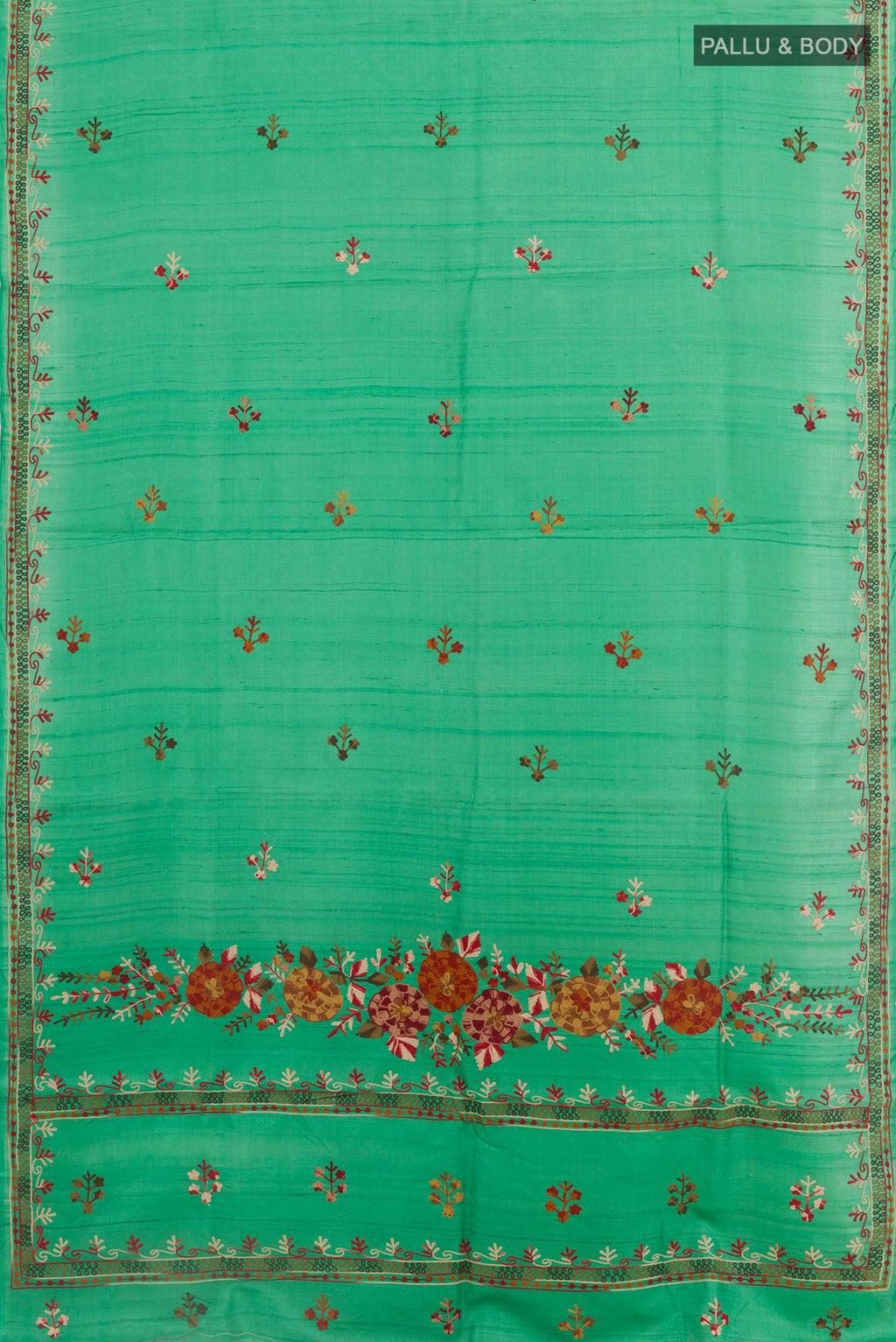 Flat view of Green Tussar Saree with Embroidery on the body and Embroidery Border. 
