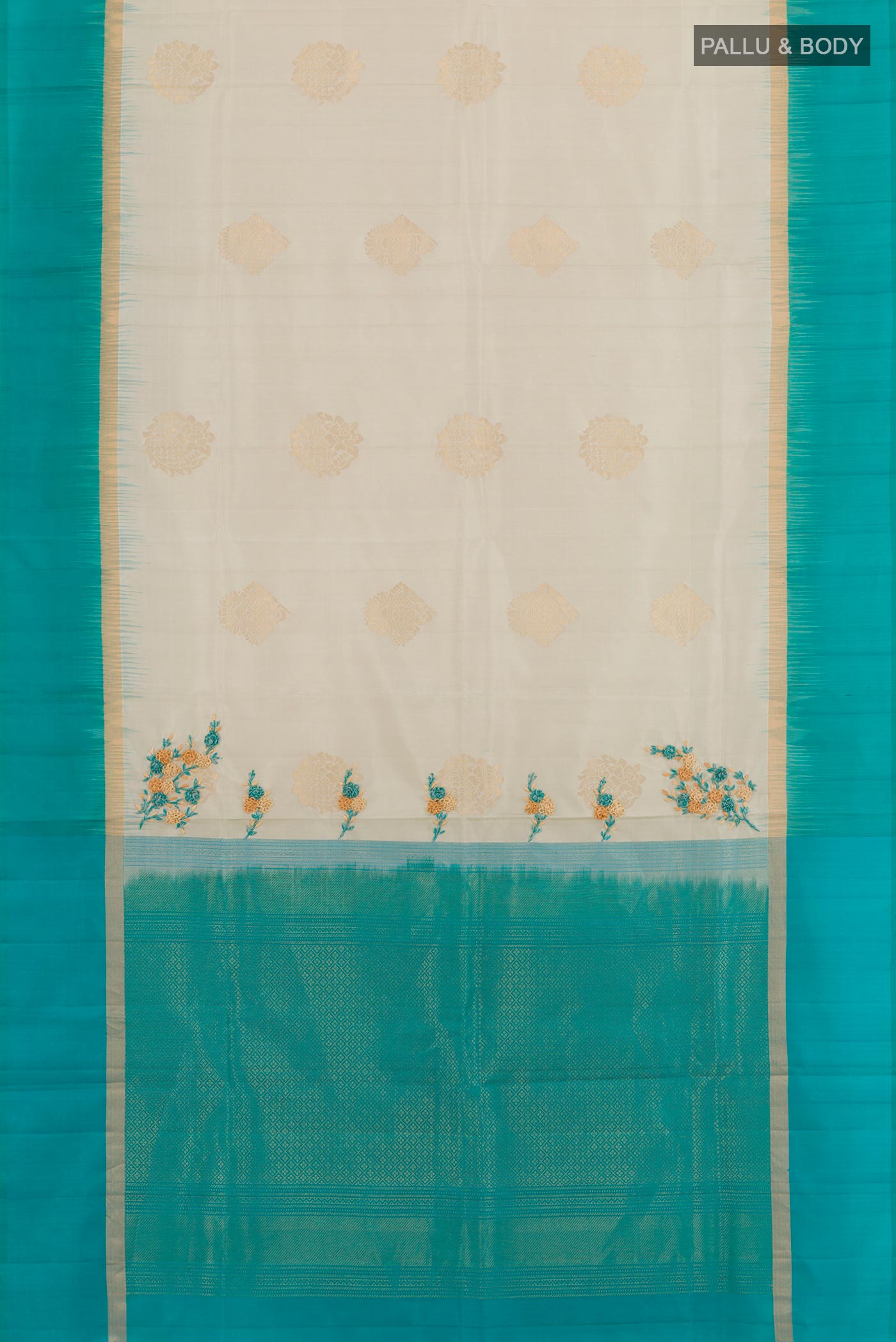 Flat view of Grey Soft Silk Saree with Zari Butta on the body and Zari Border. 