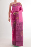 Pink Kanchipuram Silk Saree with Zari Butta on the body and Zari Border.  displayed on a mannequin