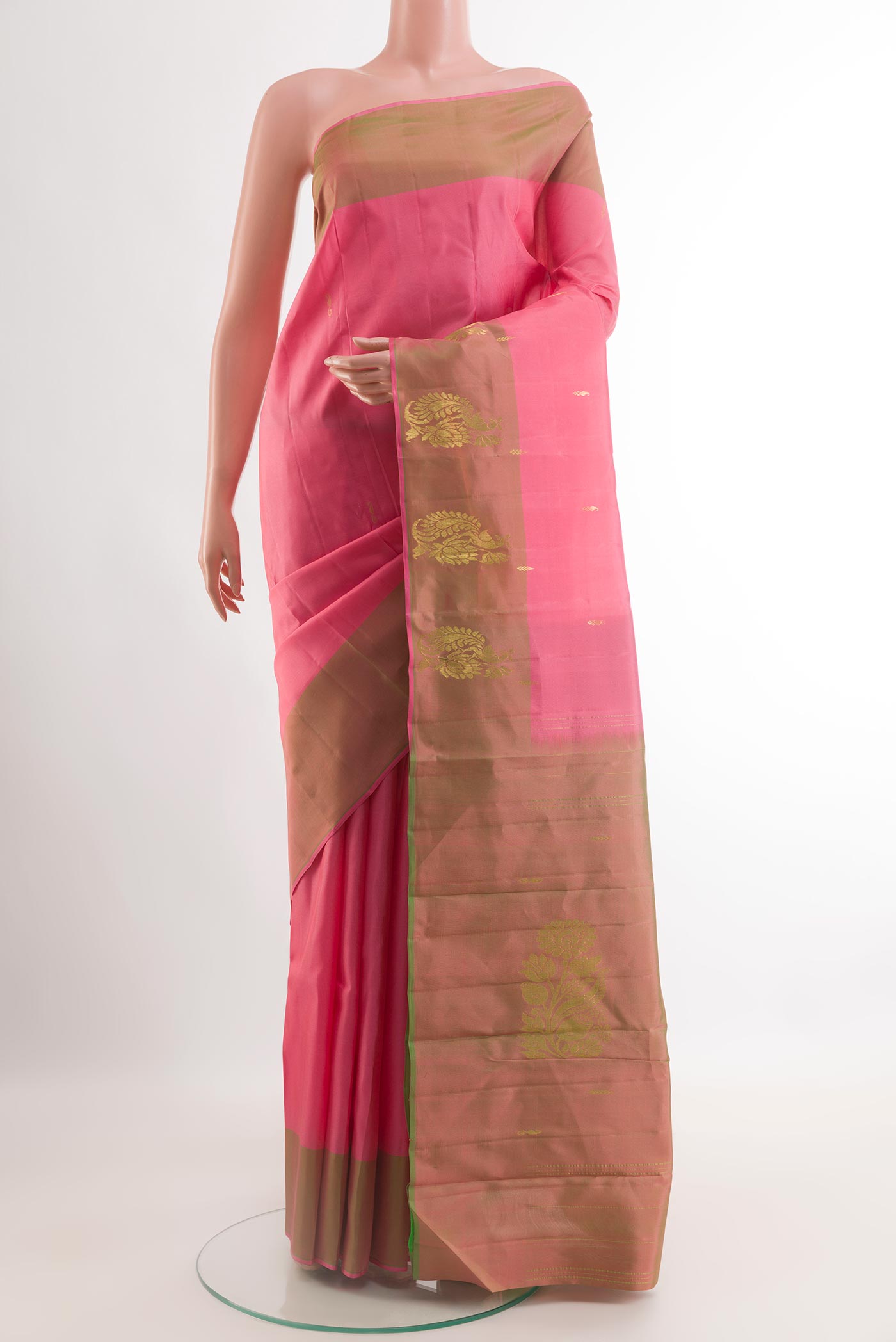 Pink Kanchipuram Silk Saree with Zari Butta on the body and Zari Border.  displayed on a mannequin