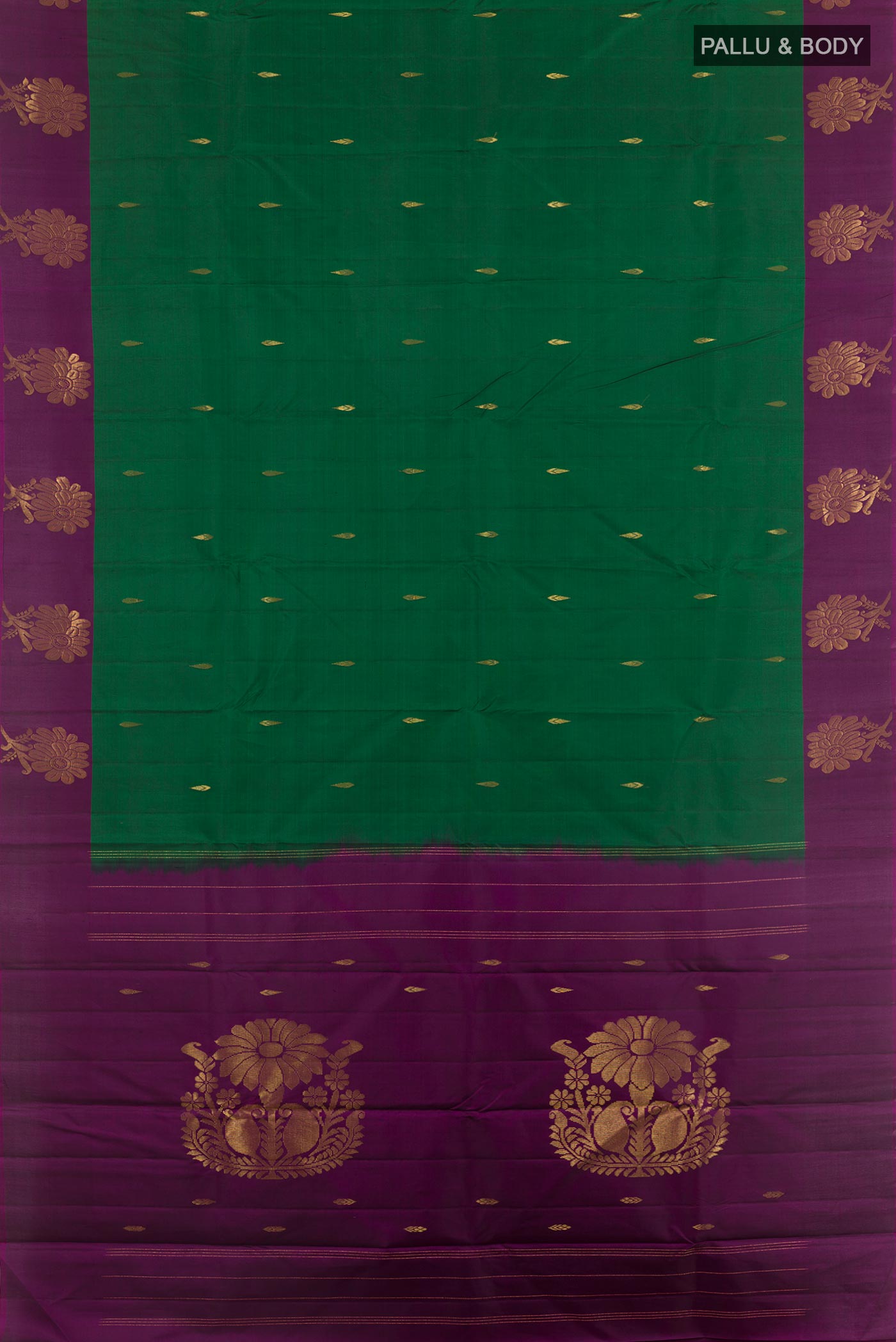 Flat view of Green Kanchipuram Silk Saree with Zari Butta on the body and Zari Border. 