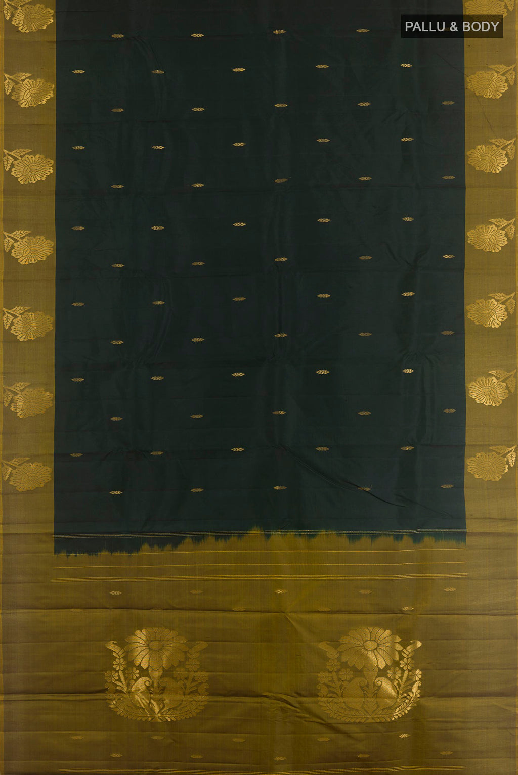 Flat view of Bottle Green Kanchipuram Silk Saree with Zari Butta on the body and Zari Border. 