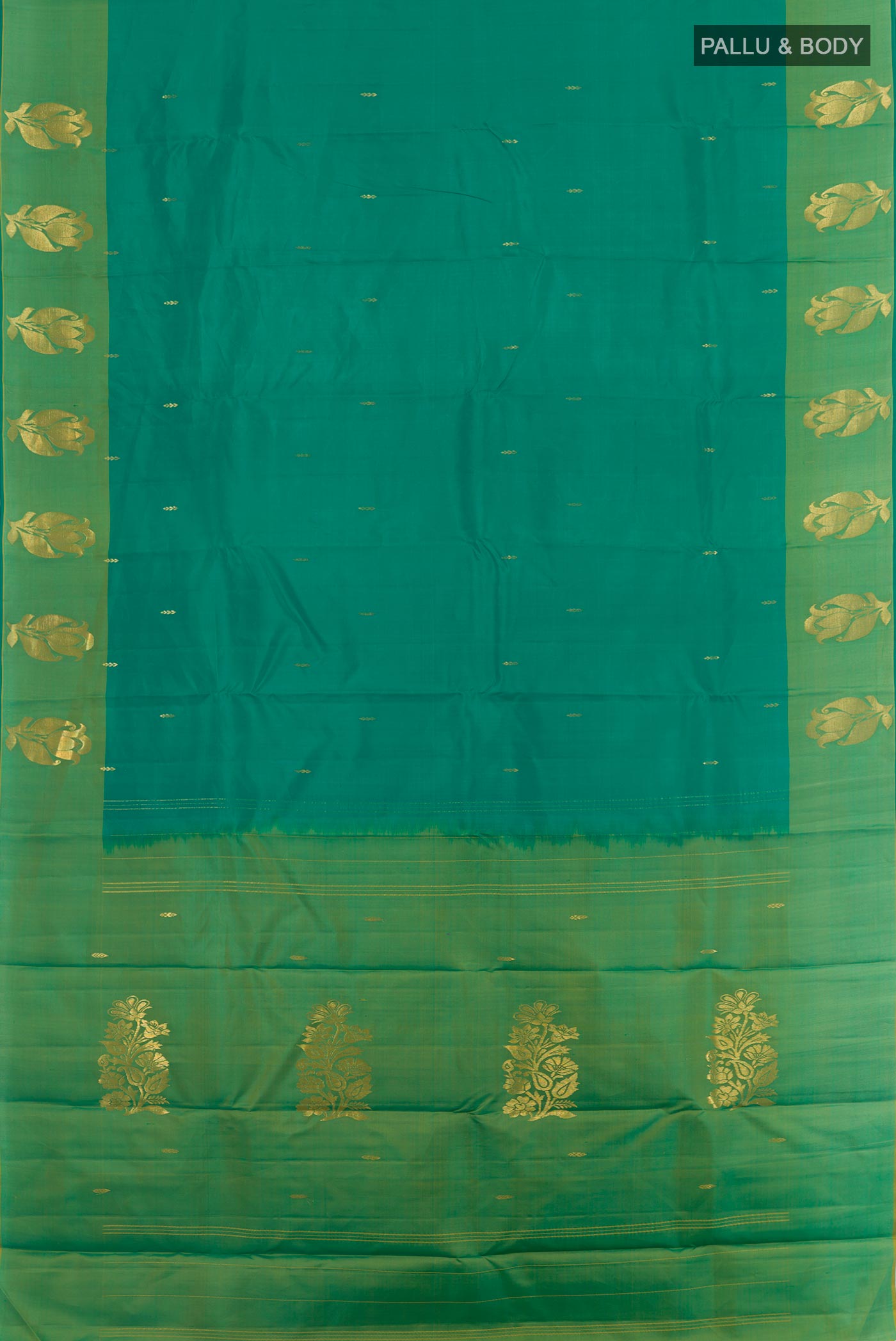 Flat view of Green Kanchipuram Silk Saree with Zari Butta on the body and Zari Border. 