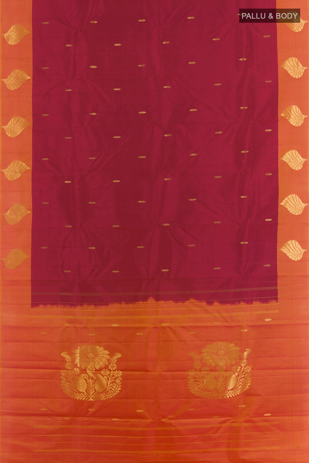 Flat view of Maroon Kanchipuram Silk Saree with Zari Butta on the body and Zari Border. 