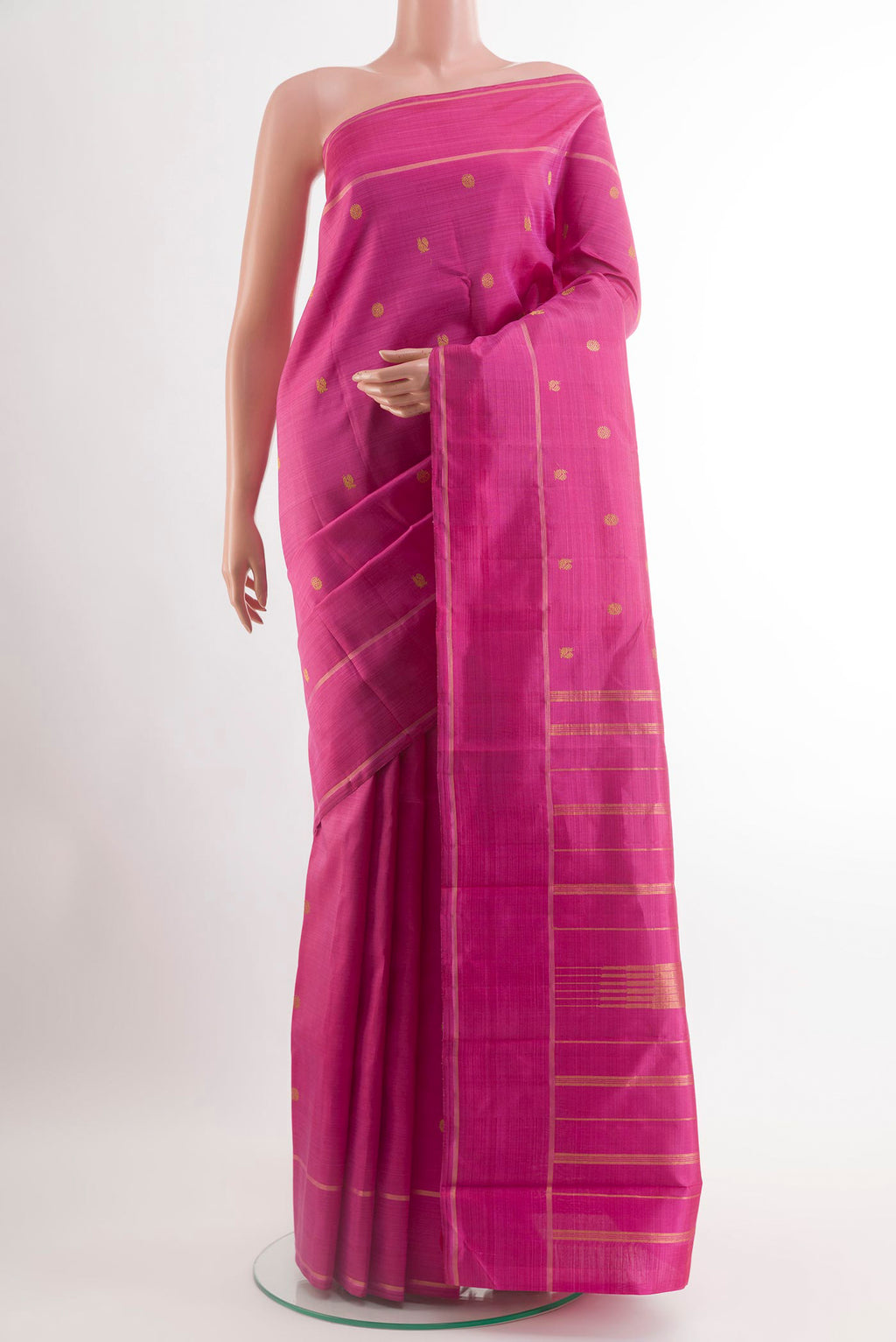 Pink Kanjivaram Silk Saree with Zari Butta on the body and Zari Border.  displayed on a mannequin