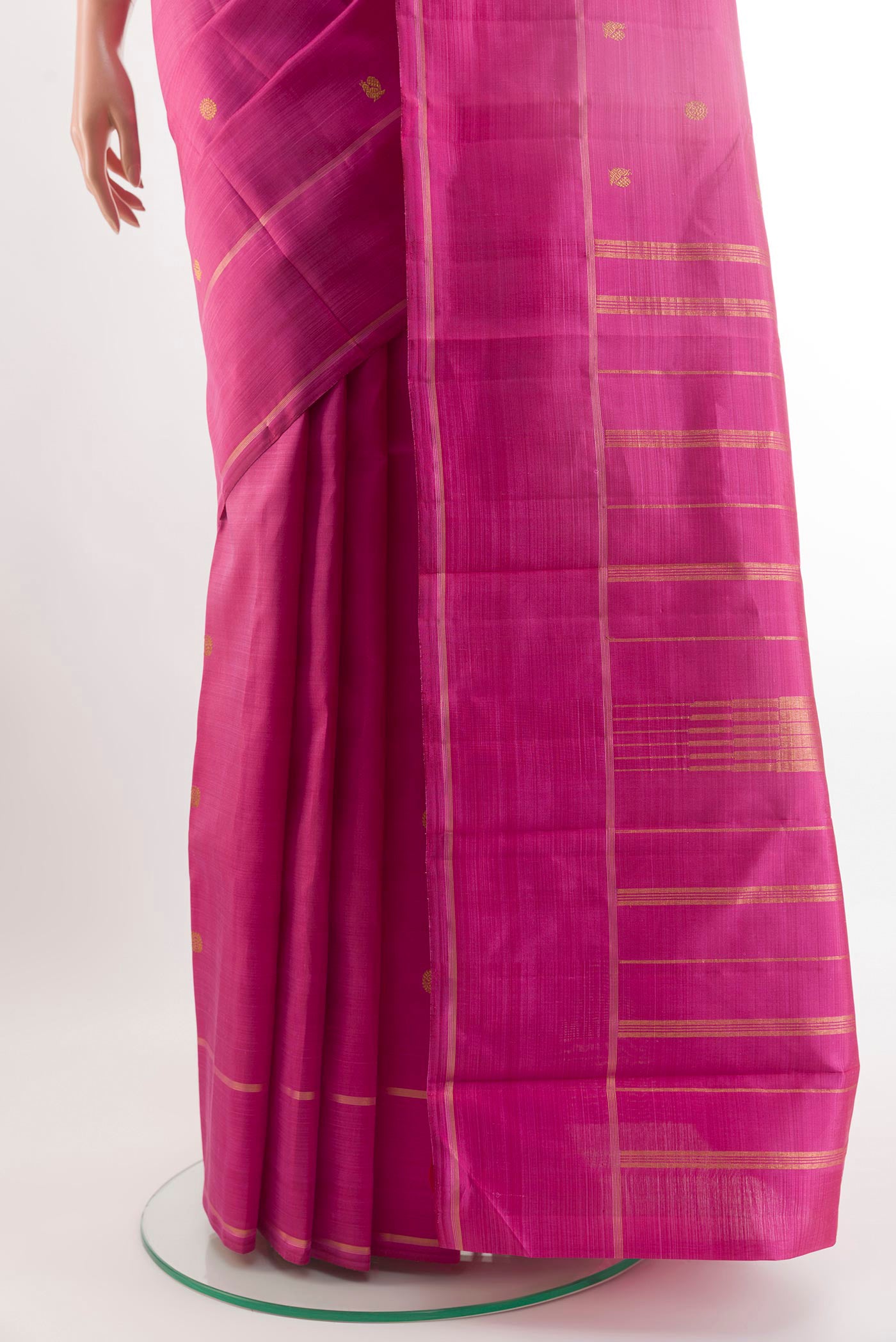 Pleats and pallu of Pink Kanjivaram Silk Saree with Zari Butta on the body and Zari Border. 