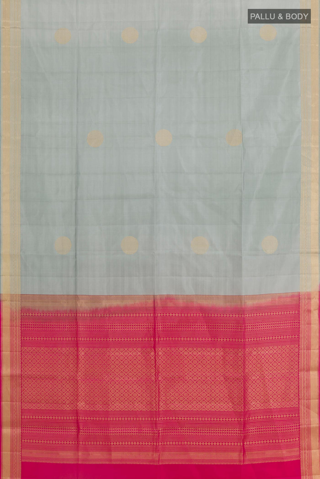 Flat view of Grey Soft Silk Saree with Zari Butta on the body and Zari Border. 