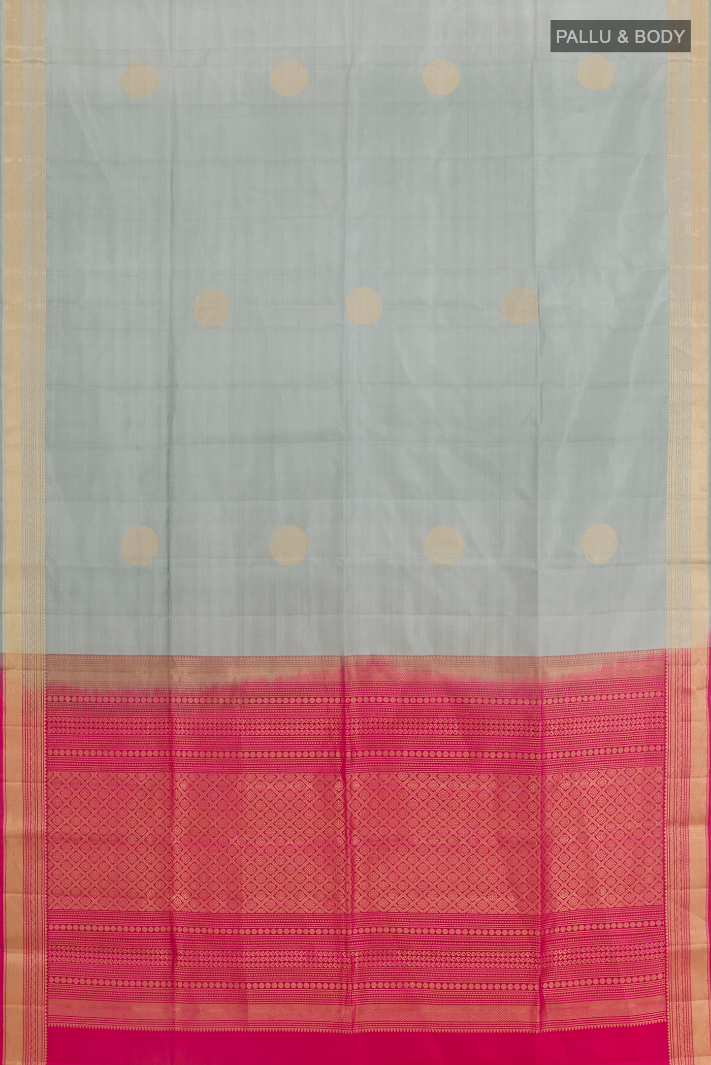 Flat view of Grey Soft Silk Saree with Zari Butta on the body and Zari Border. 