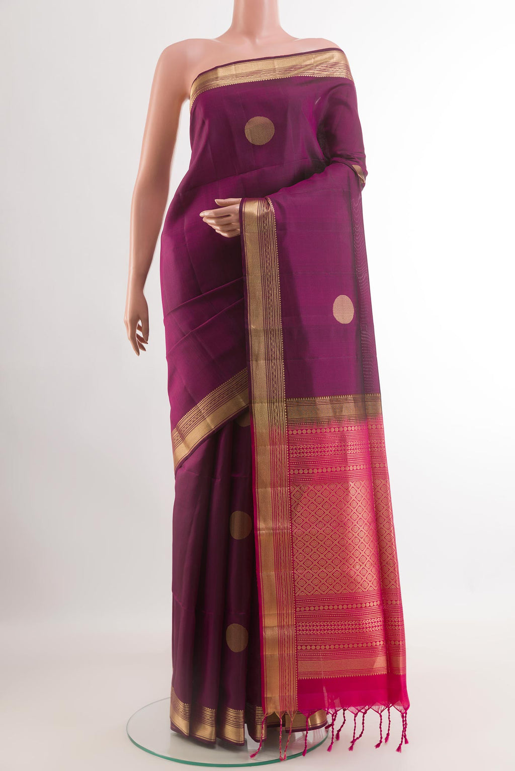 Purple Soft Silk Saree with Zari Butta on the body and Zari Border.  displayed on a mannequin