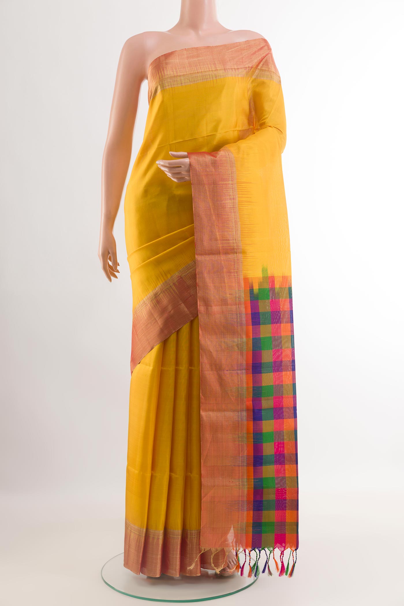 Yellow Soft Silk Saree with Plain Body and Zari Border.  displayed on a mannequin