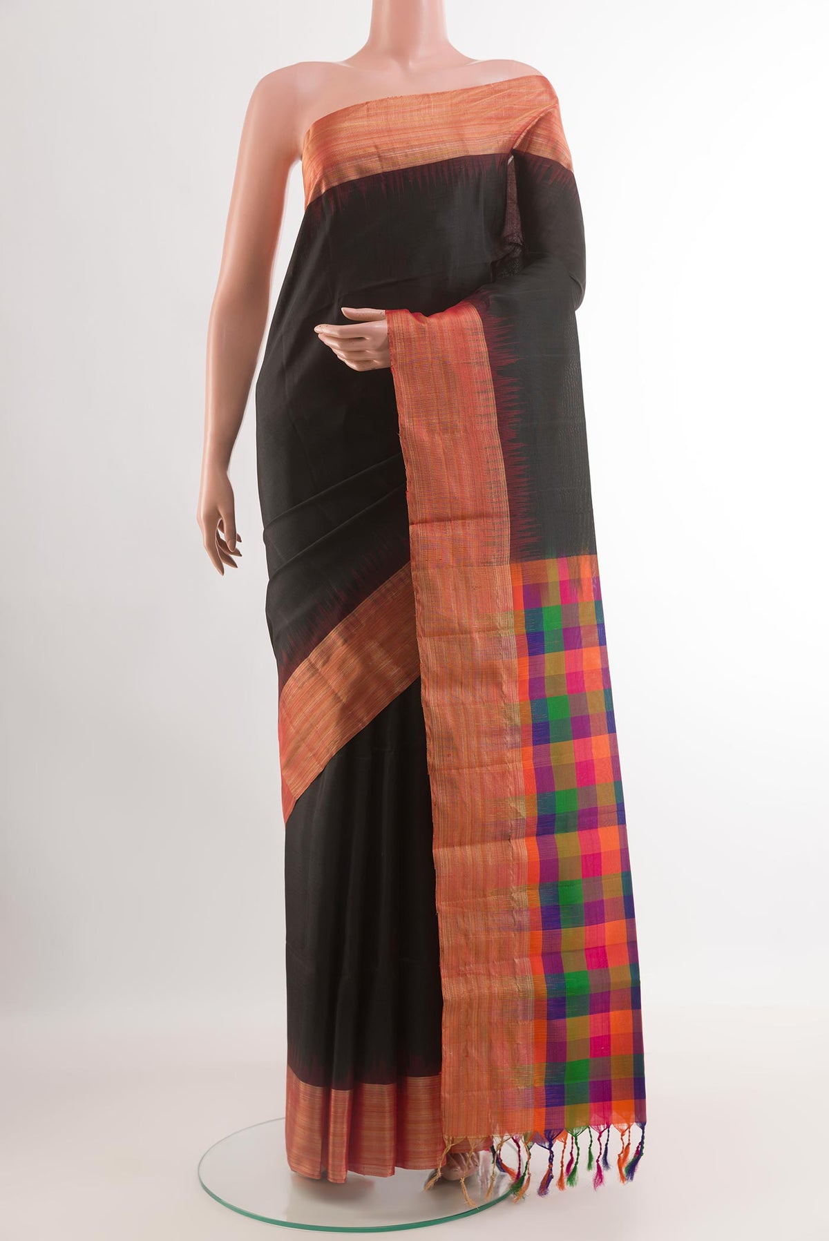 Black Soft Silk Saree with Plain Body and Zari Border.  displayed on a mannequin