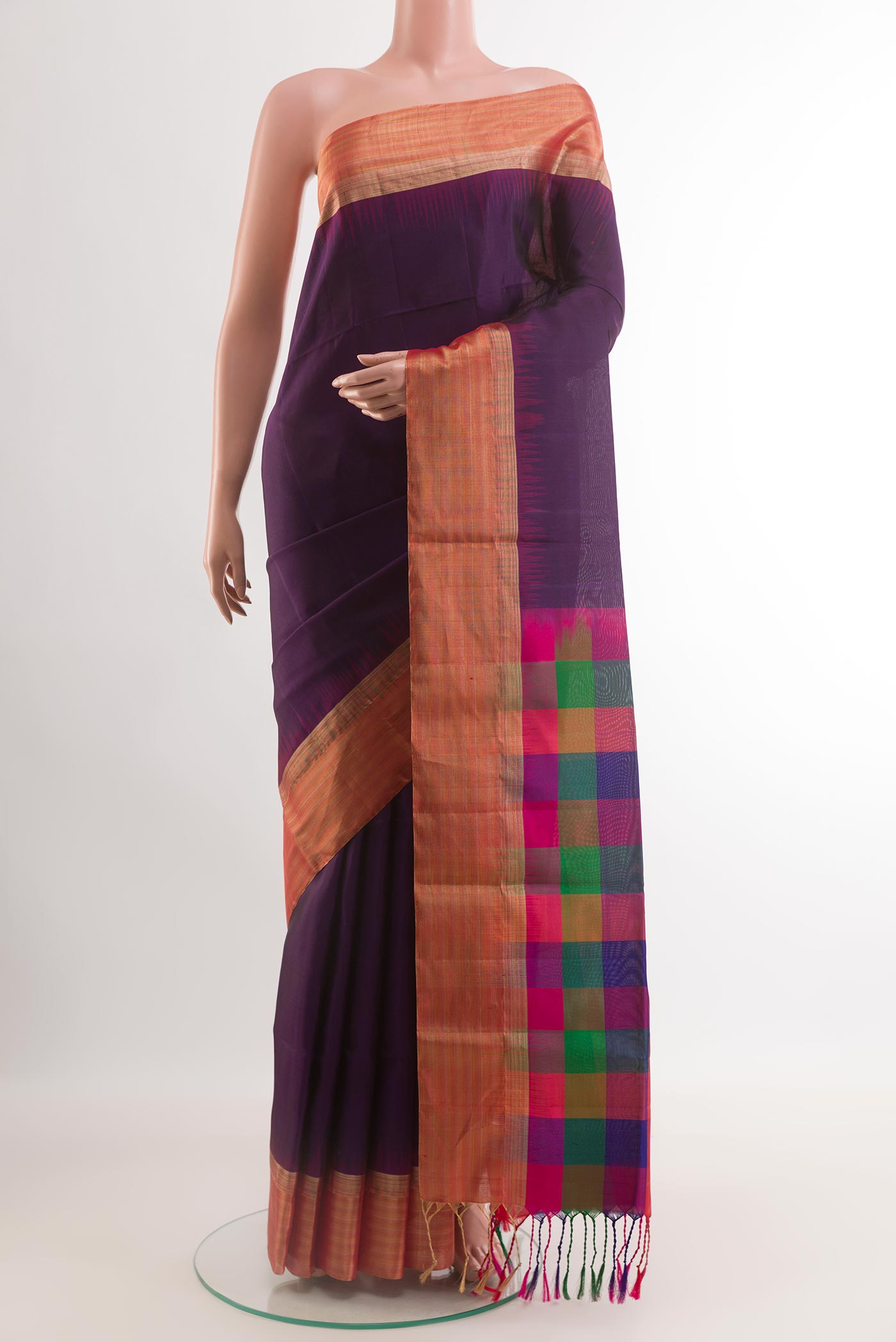 Purple Soft Silk Saree with Plain Body and Zari Border.  displayed on a mannequin