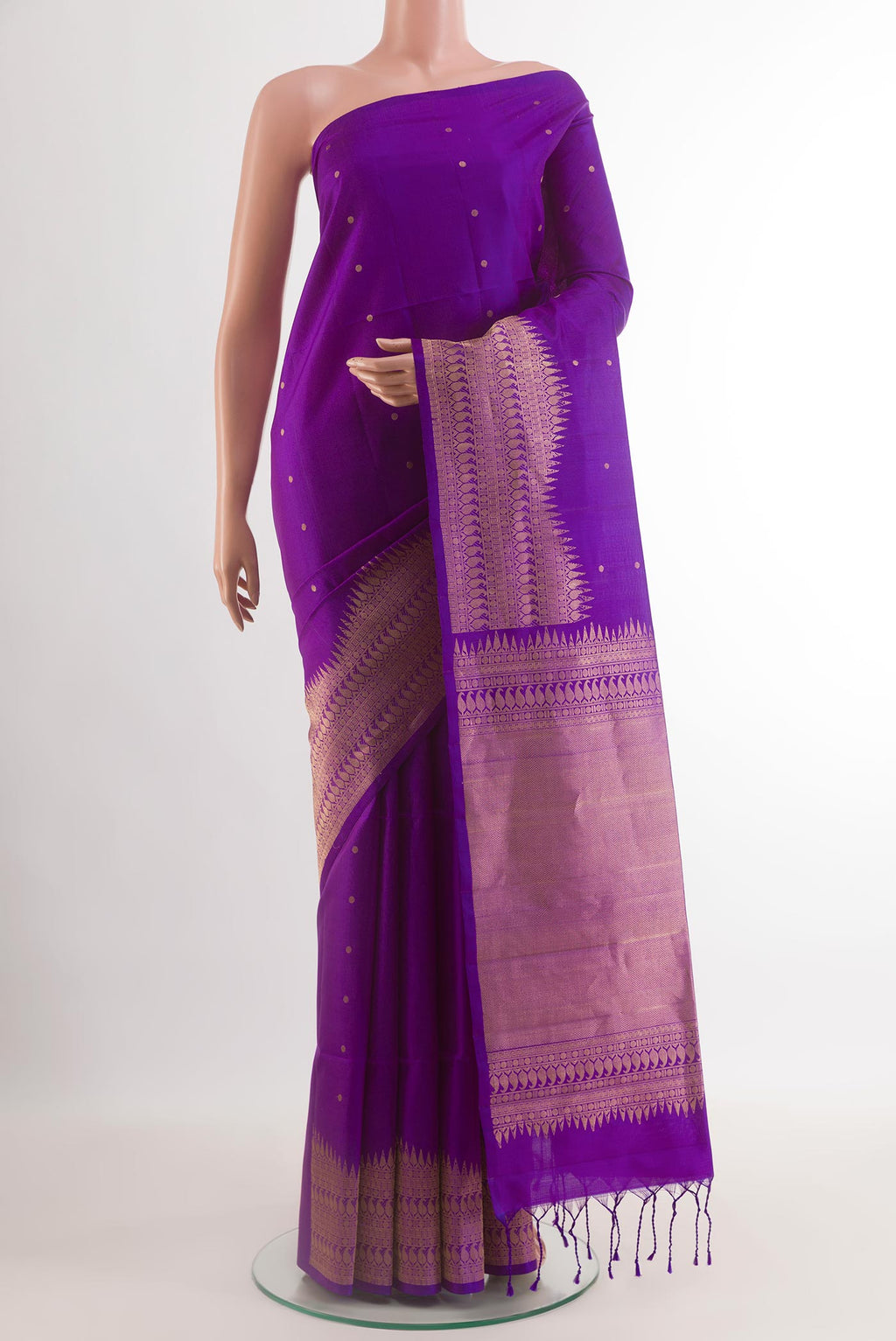 Purple Soft Silk Saree with Zari Butta on the body and Zari Border.  displayed on a mannequin