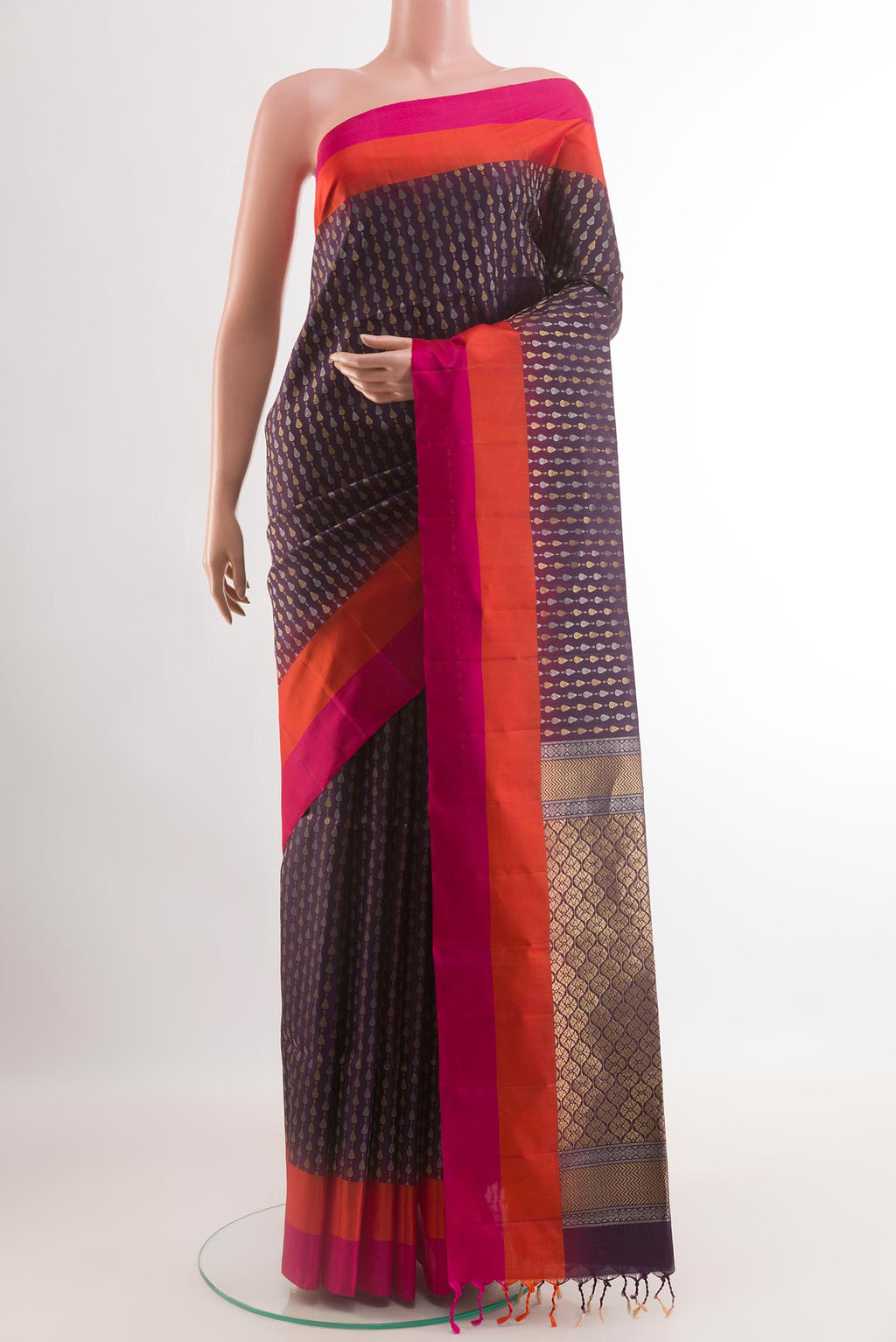 Purple Soft Silk Saree with Zari Butta on the body and Zari Border.  displayed on a mannequin