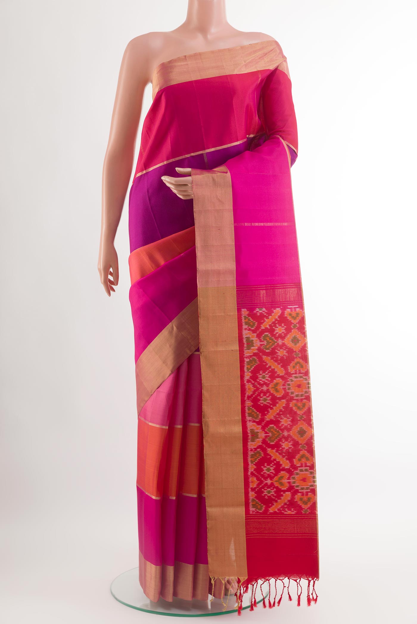 Multi Color Soft Silk Saree with Zari Butta on the body and Zari Border.  displayed on a mannequin