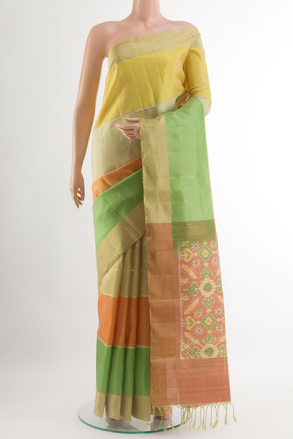 Multi Color Soft Silk Saree with Zari Butta on the body and Zari Border.  displayed on a mannequin