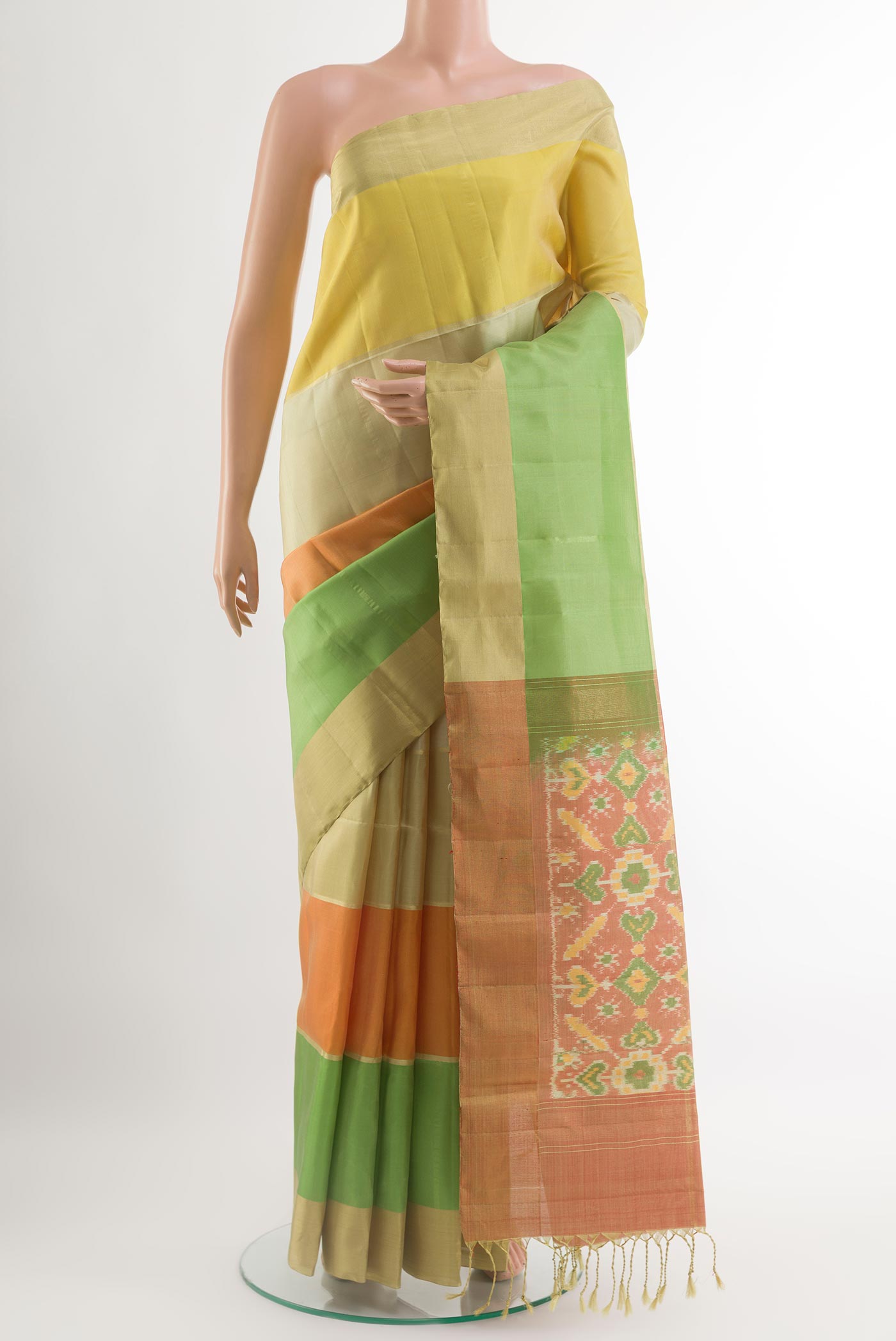 Multi Color Soft Silk Saree with Zari Butta on the body and Zari Border.  displayed on a mannequin