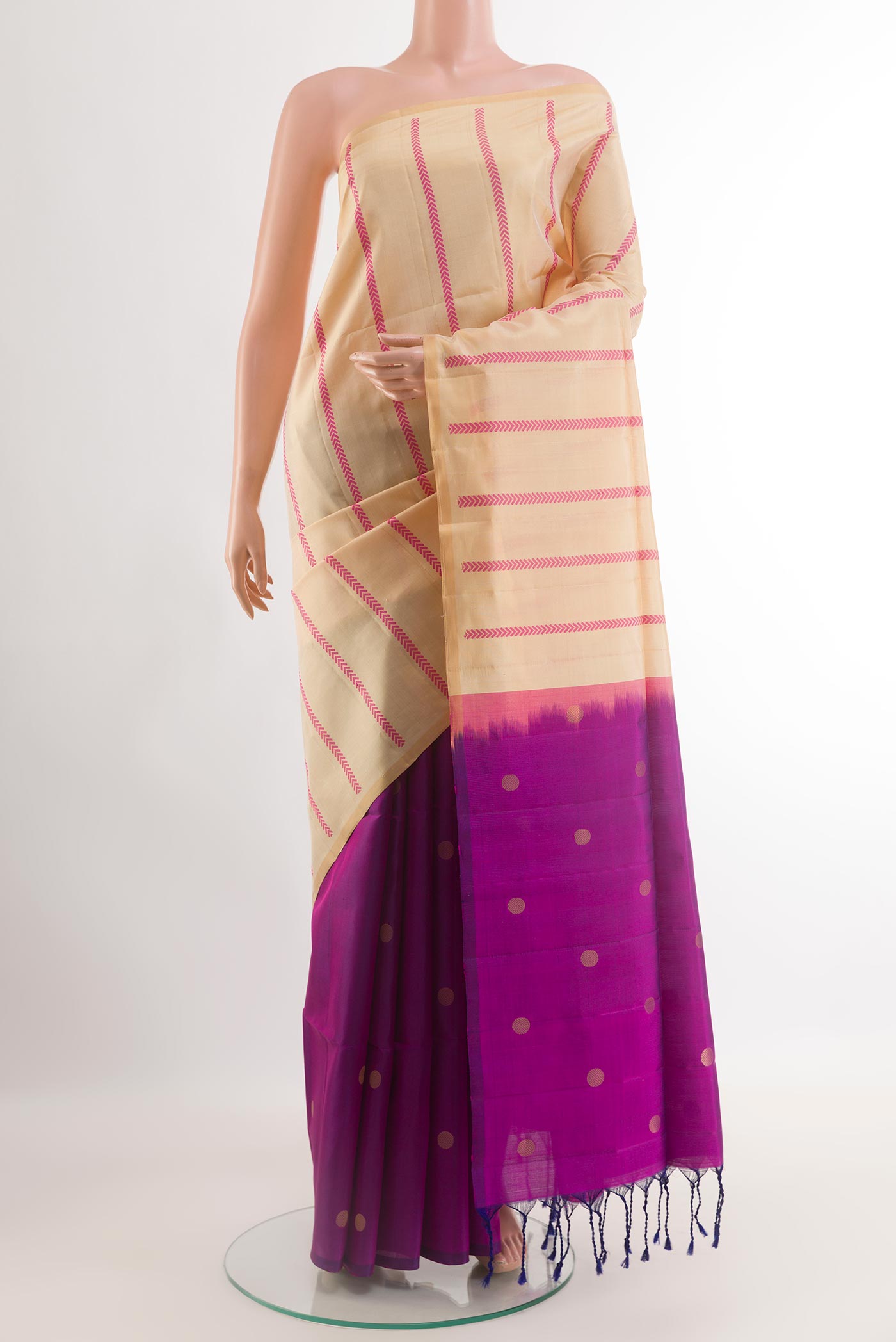 Beige Soft Silk Saree with Stripes on the body and Zari Border.  displayed on a mannequin