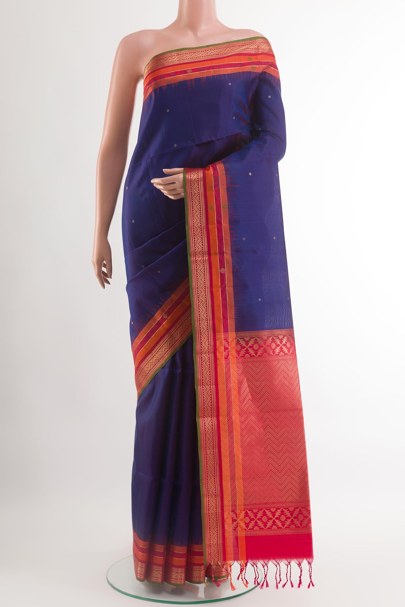 Blue Soft Silk Saree with Zari Butta on the body and Zari Border.  displayed on a mannequin
