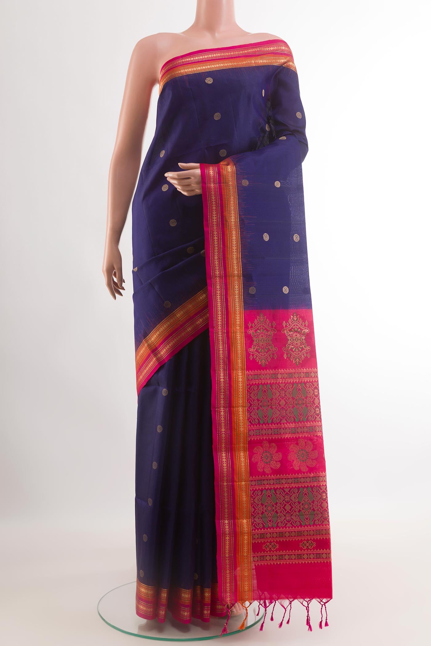 Blue Soft Silk Saree with Zari Butta on the body and Zari Border.  displayed on a mannequin
