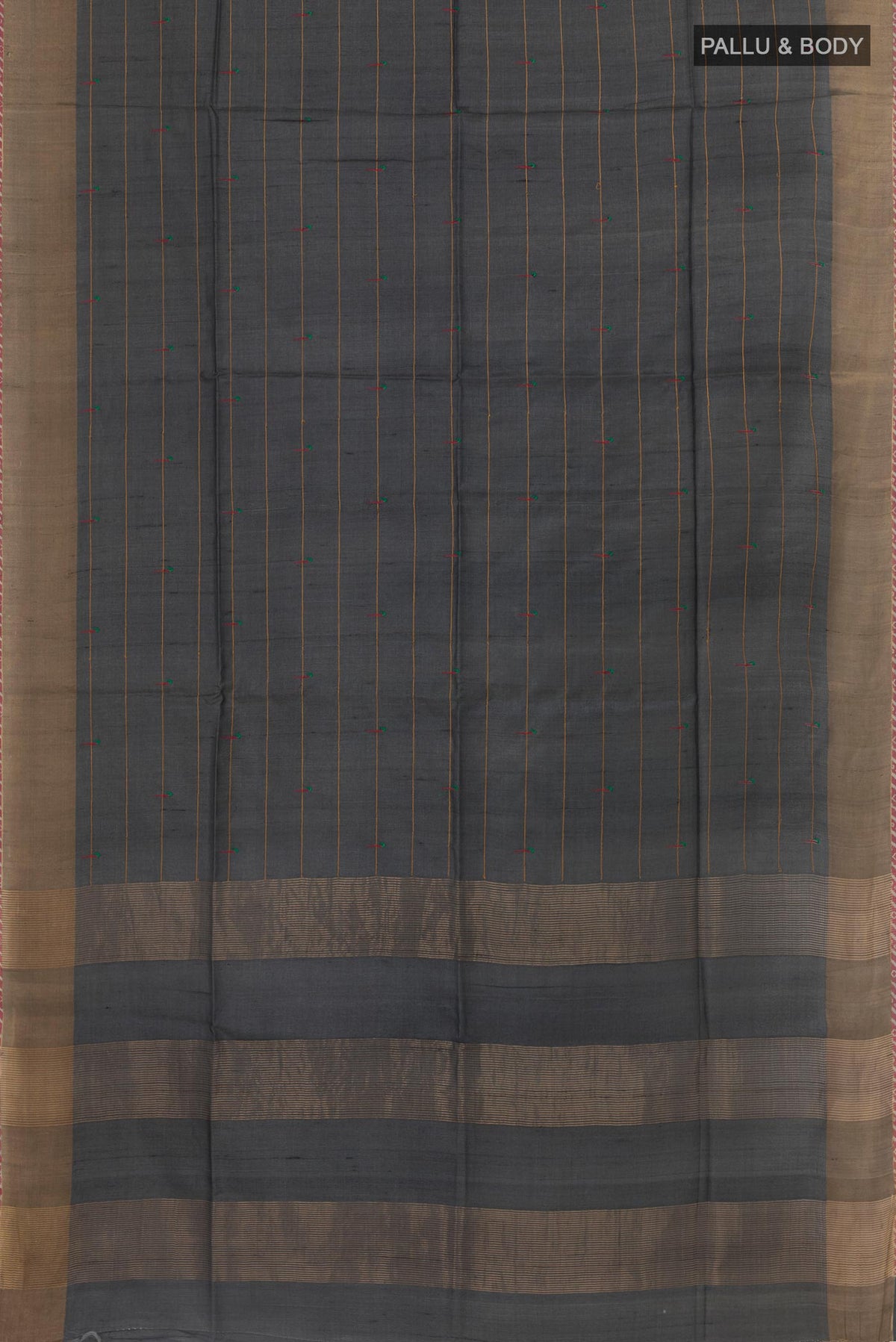 Flat view of Grey Tussar Saree with Thread Butta on the body and Zari Border. 